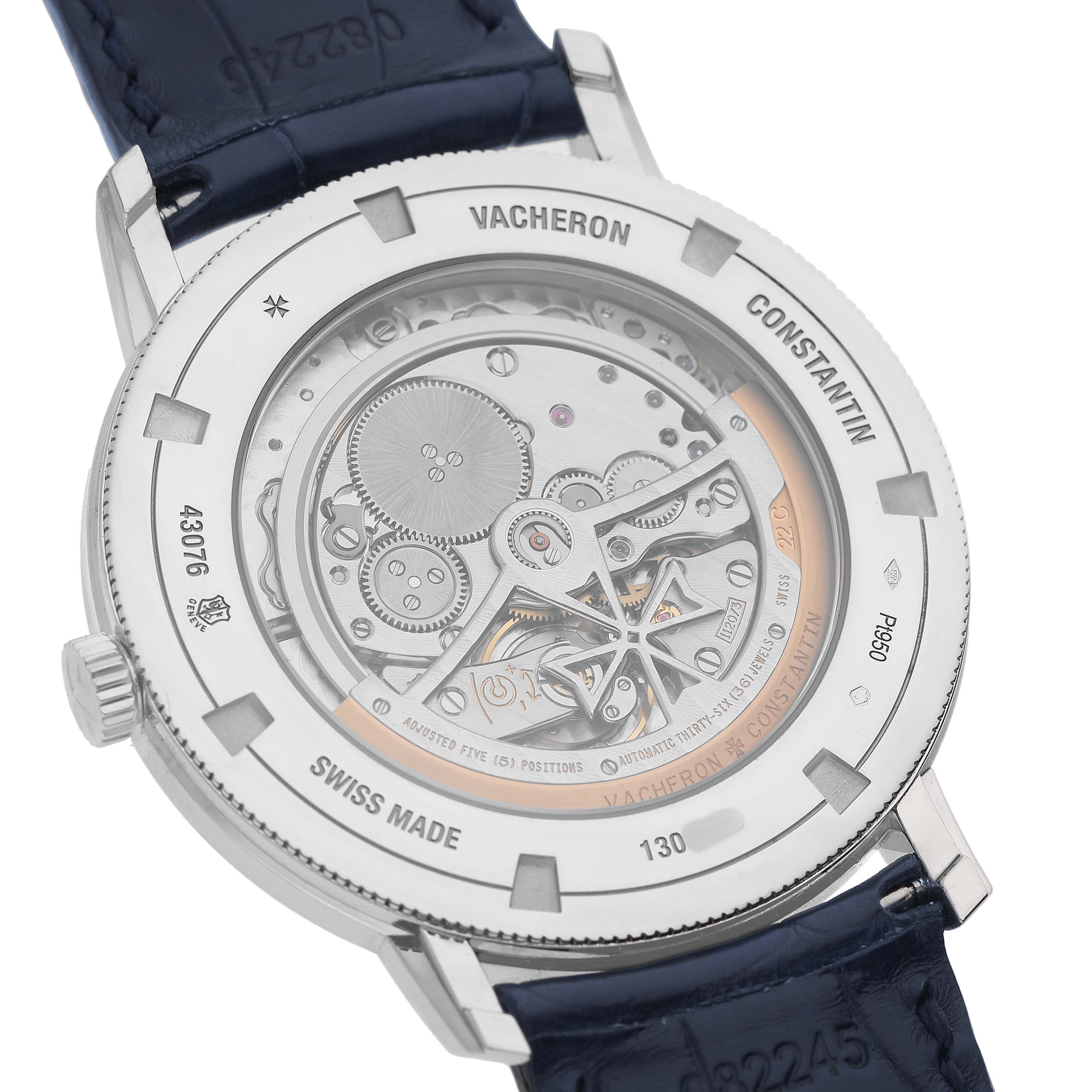 The image shows the back of a Vacheron Constantin Traditionnelle 43076 Men's Platinum Silver Dial watch, highlighting the intricately detailed movement and rotor.