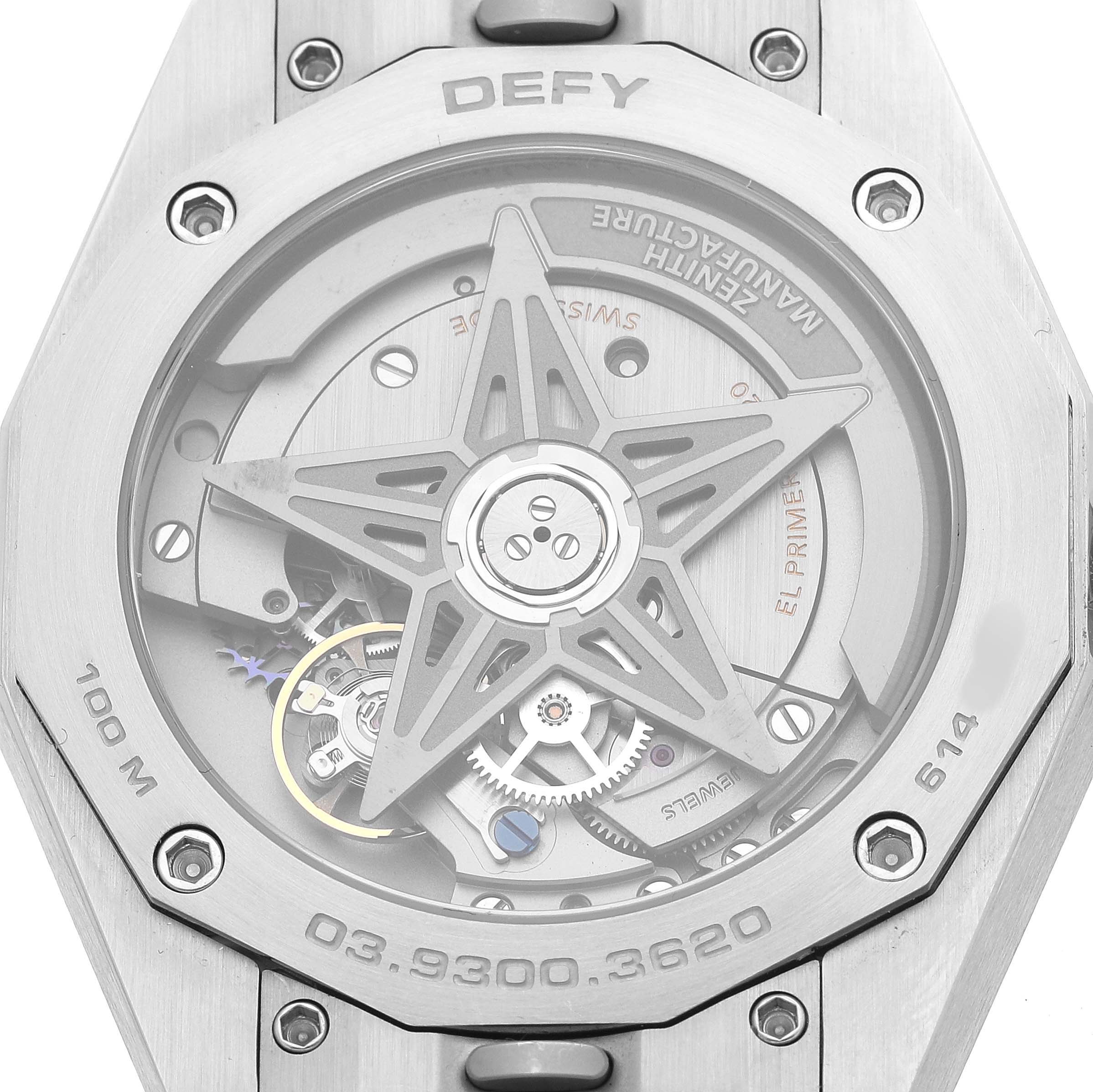 The image shows the back view of the Zenith Defy 03.9300.3620 Men's Stainless Steel Black Dial watch, highlighting the movement and rotor design.