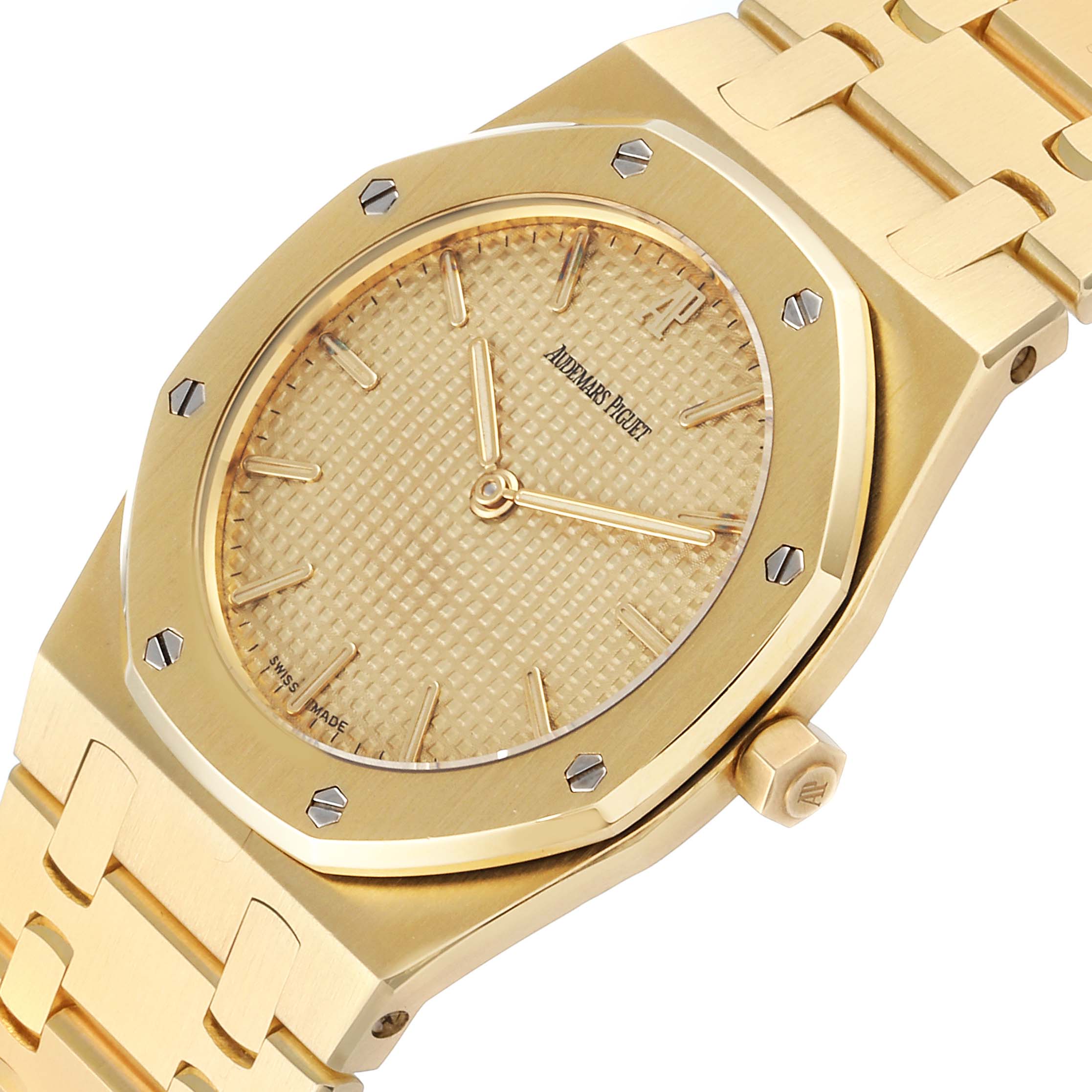 The image shows a close-up of the Audemars Piguet Royal Oak  Men's Yellow Gold Champagne Dial  Men's Yellow Gold Champagne Dial, highlighting the watch face, bezel, and part of the bracelet.