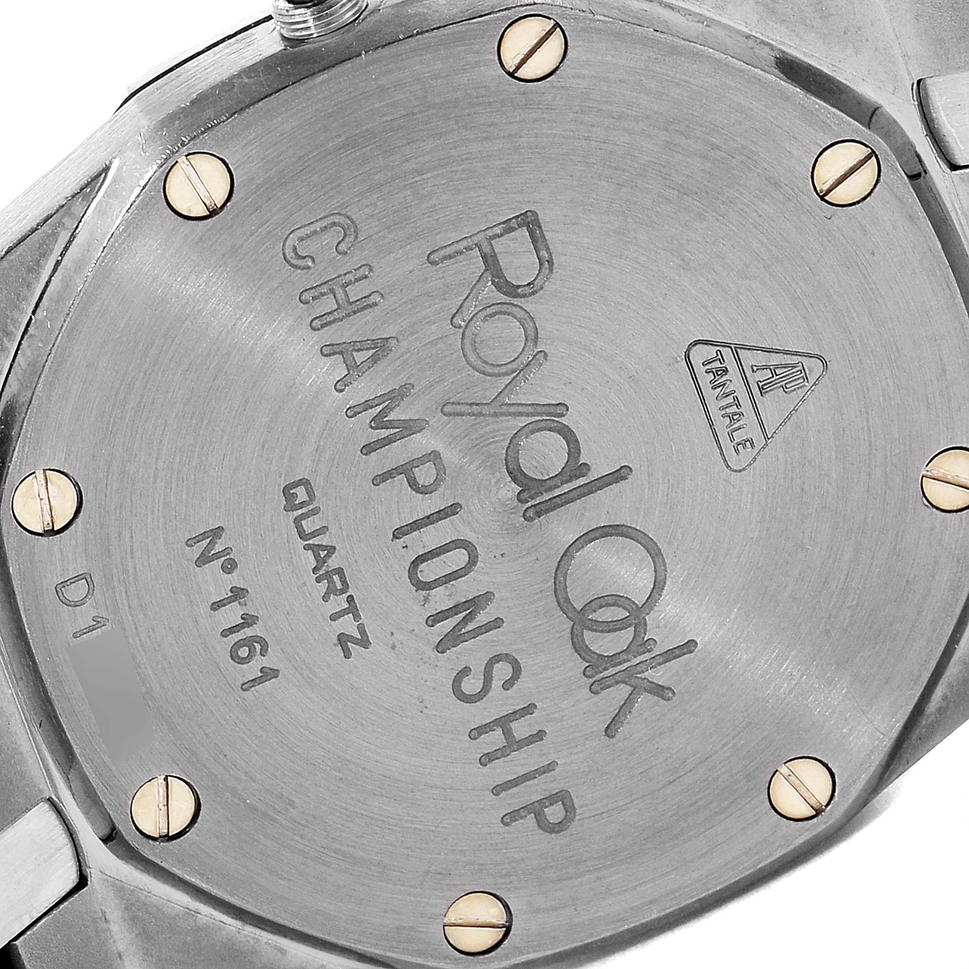 The image shows the back case of a Royal Oak model by Audemars Piguet, featuring engravings and screws.