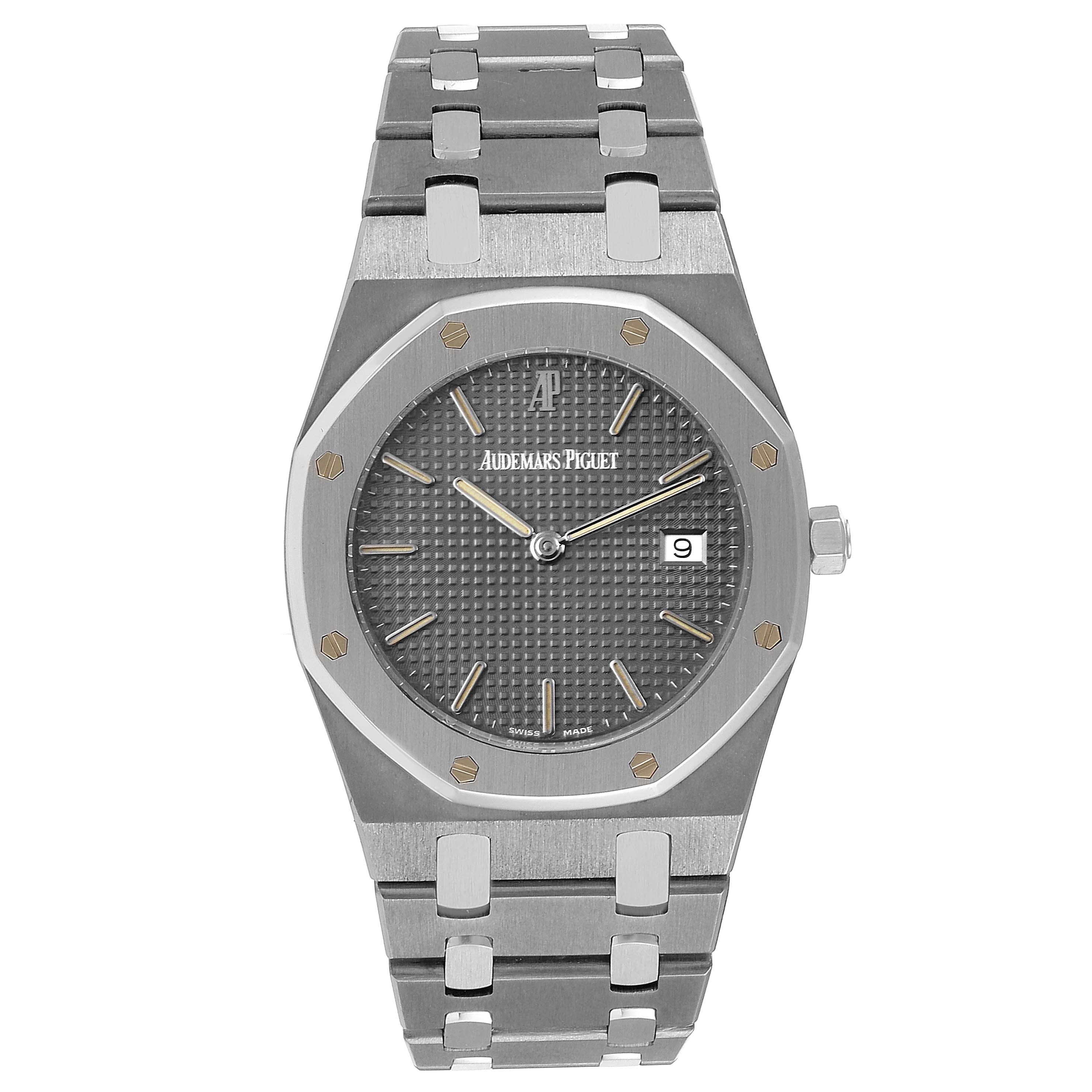 The image shows a front view of the Royal Oak model by Audemars Piguet, highlighting the watch face, bezel, and bracelet.