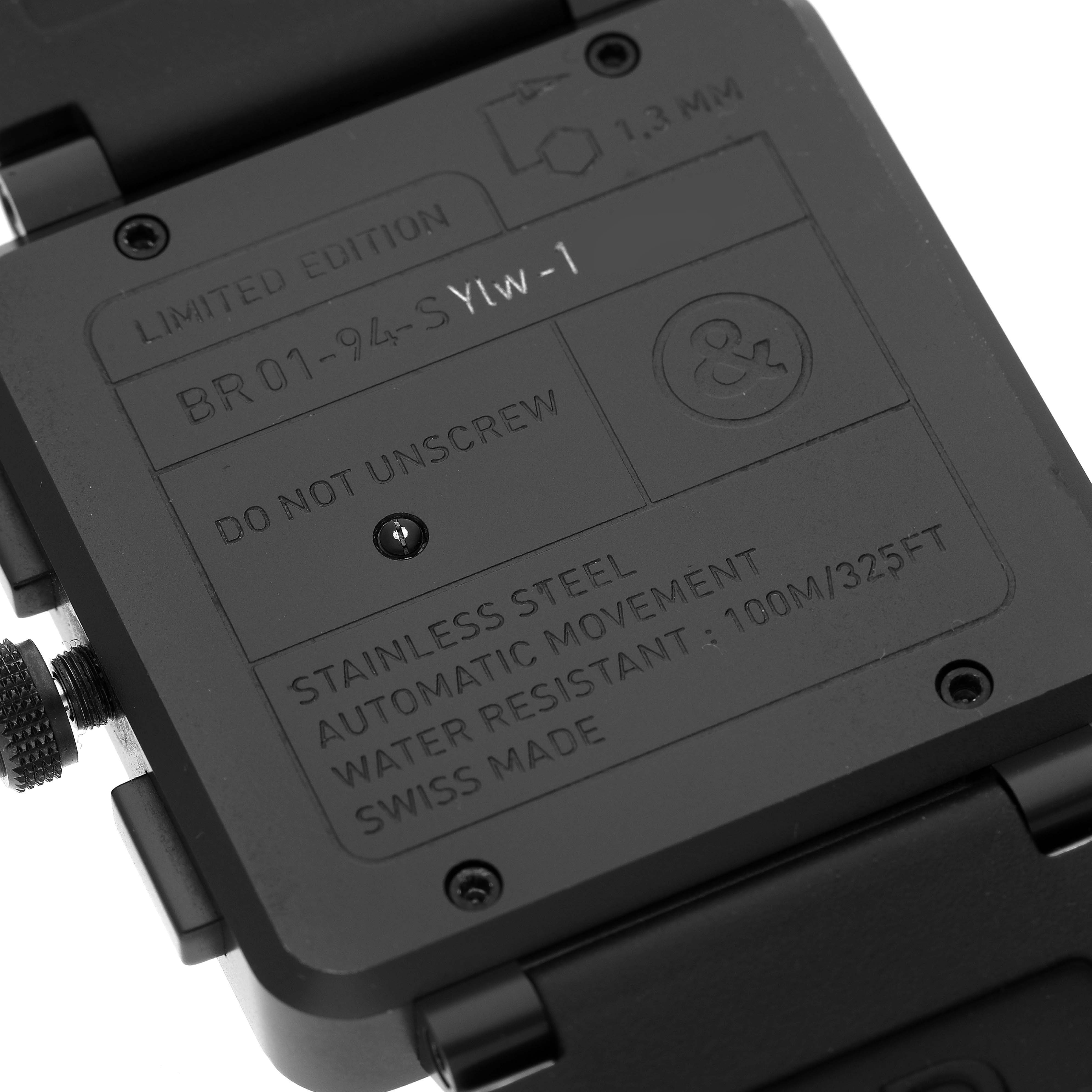 The image shows the back case of the Bell 
Ross BR01-94-S Chronograph watch, highlighting its specifications.