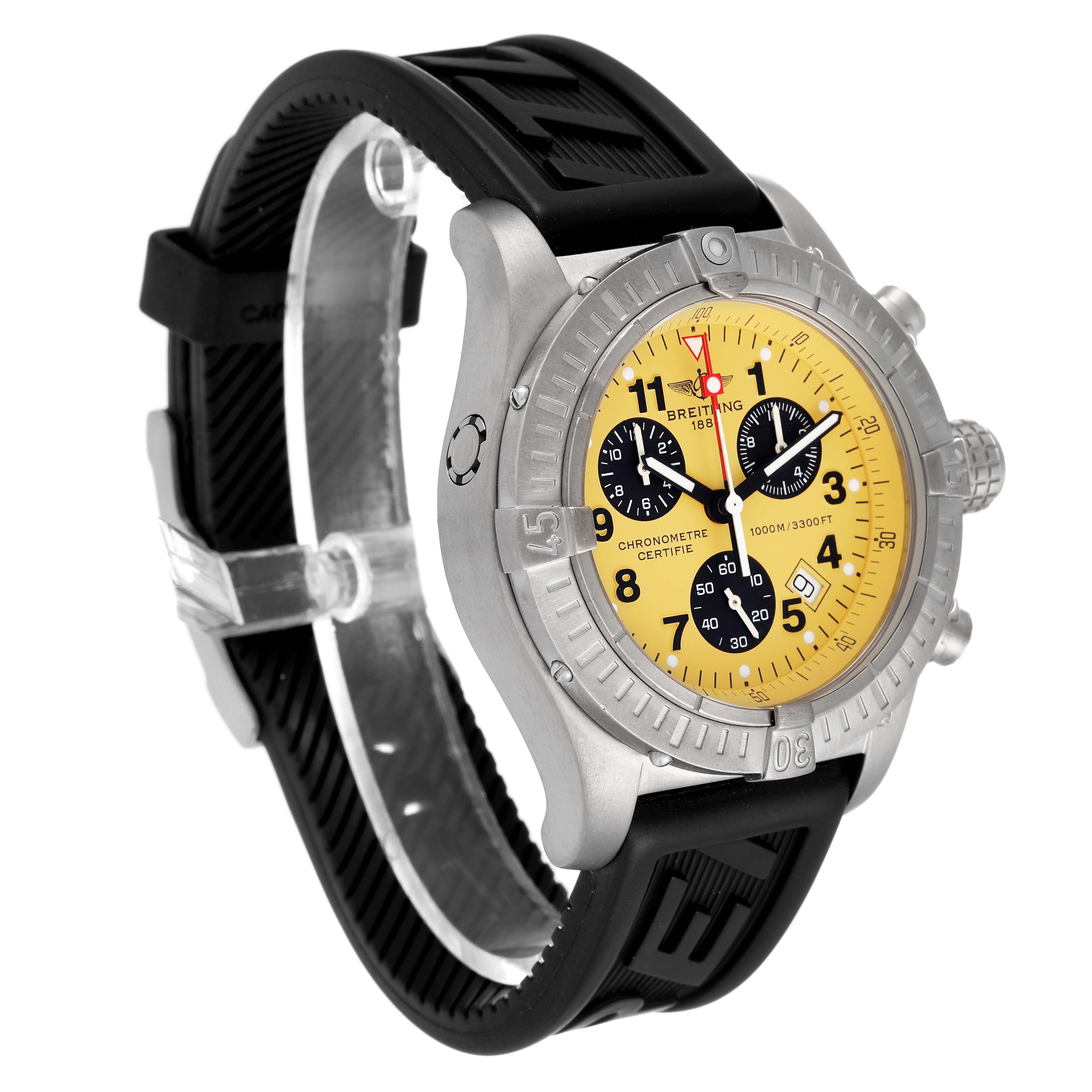 This image shows a side-front angle of a Breitling Avenger E73360 Men's Titanium Yellow Dial E73360 Men's Titanium Yellow Dial watch, highlighting its yellow dial, chronograph functions, and black rubber strap.