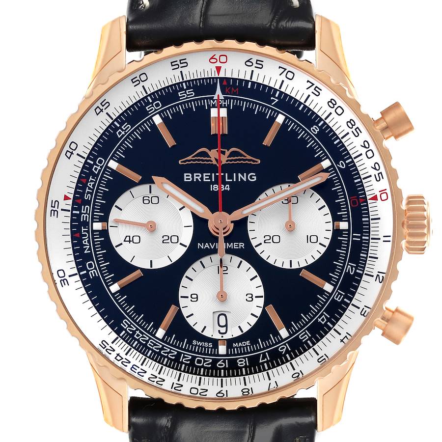 The Breitling Navitimer watch is shown from a front angle, highlighting the dial, subdials, and bezel.