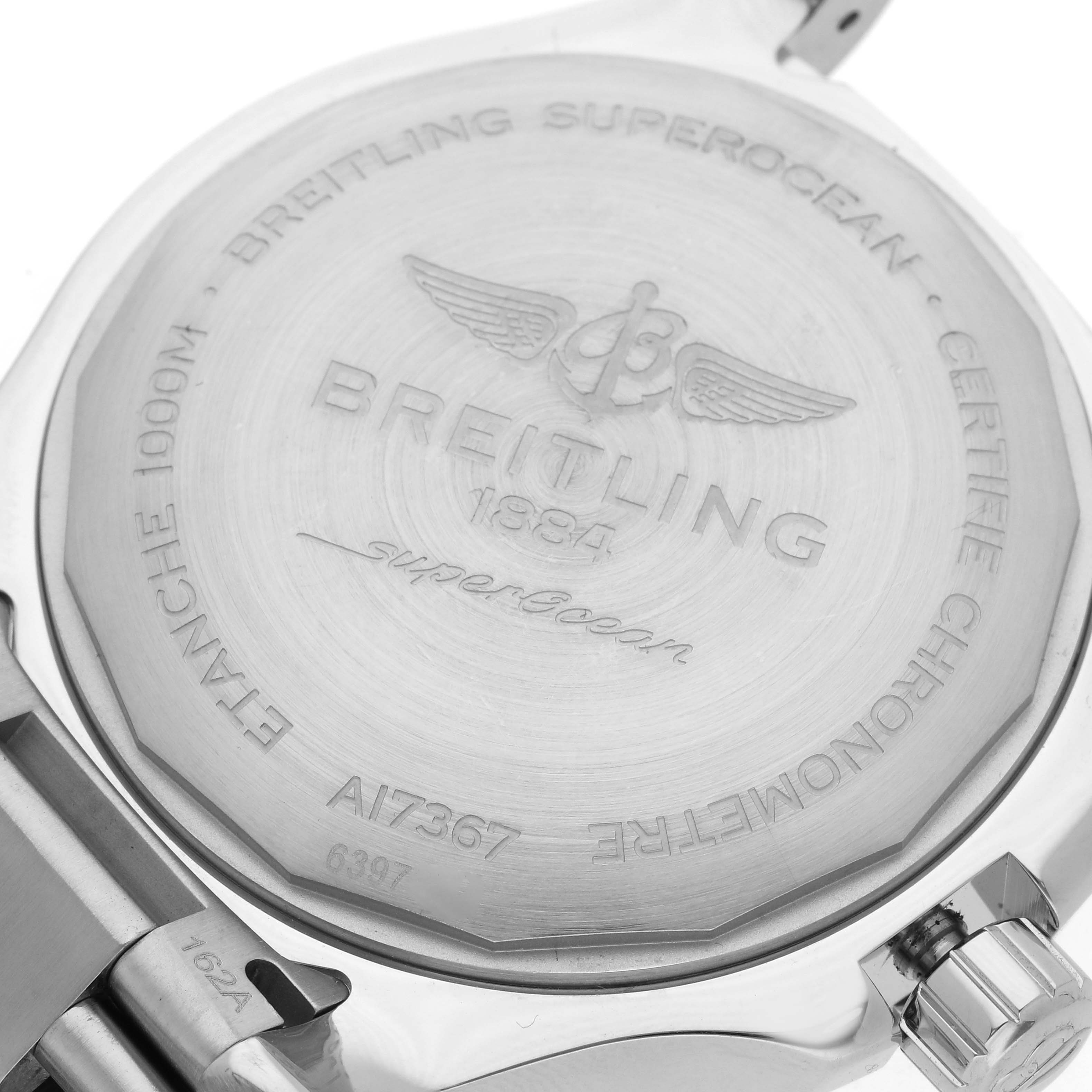 The image shows the case back of a Breitling Superocean A17367 Men's Stainless Steel Black Dial A17367 Men's Stainless Steel Black Dial watch, highlighting engravings and part of the bracelet.