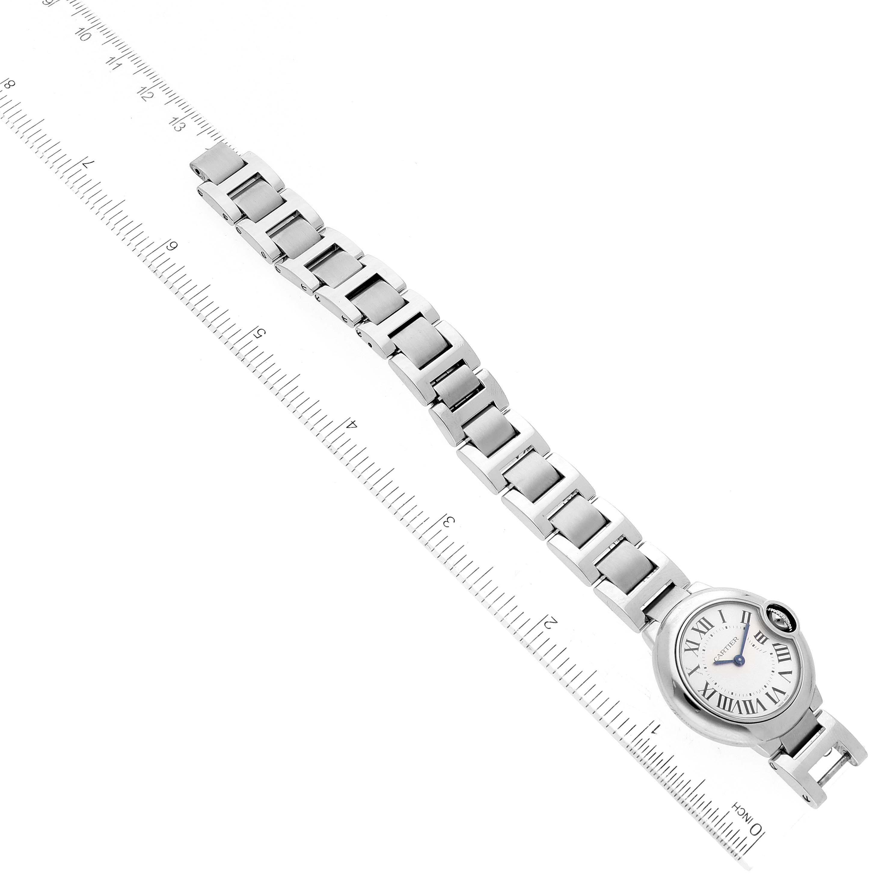 This image shows a top view of the Cartier Ballon Bleu W69010Z4 Women's Stainless Steel Silver Dial W69010Z4 Women's Stainless Steel Silver Dial watch, including the face and entire bracelet, with a measuring scale alongside.