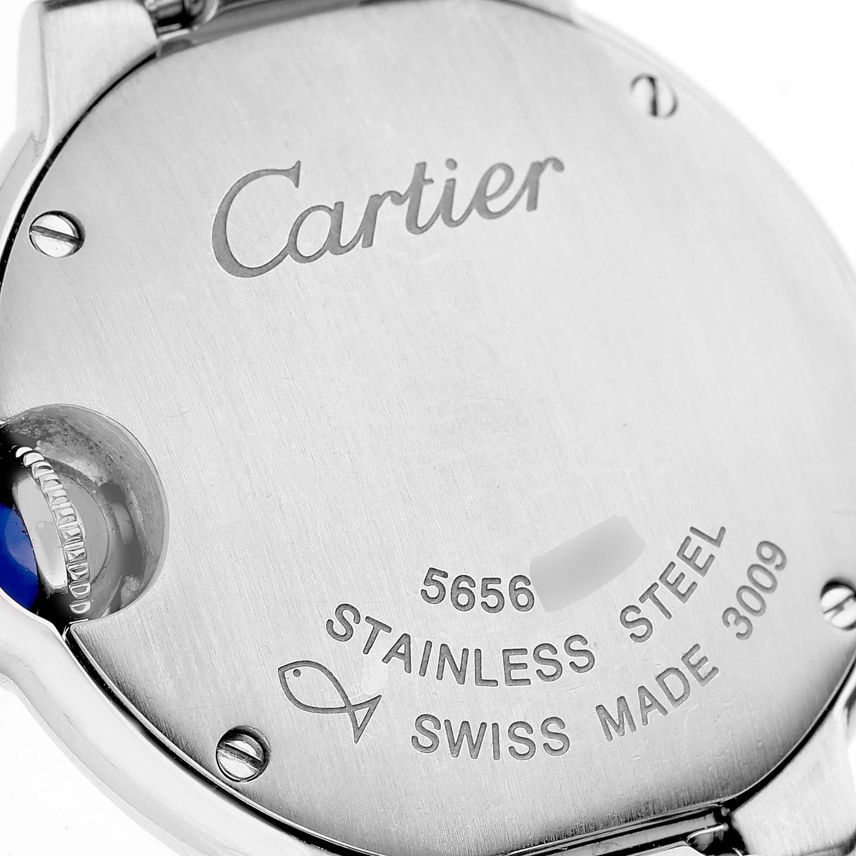 The image shows the back casing of a Ballon Bleu model by Cartier, focusing on details like the brand engraving and material information.