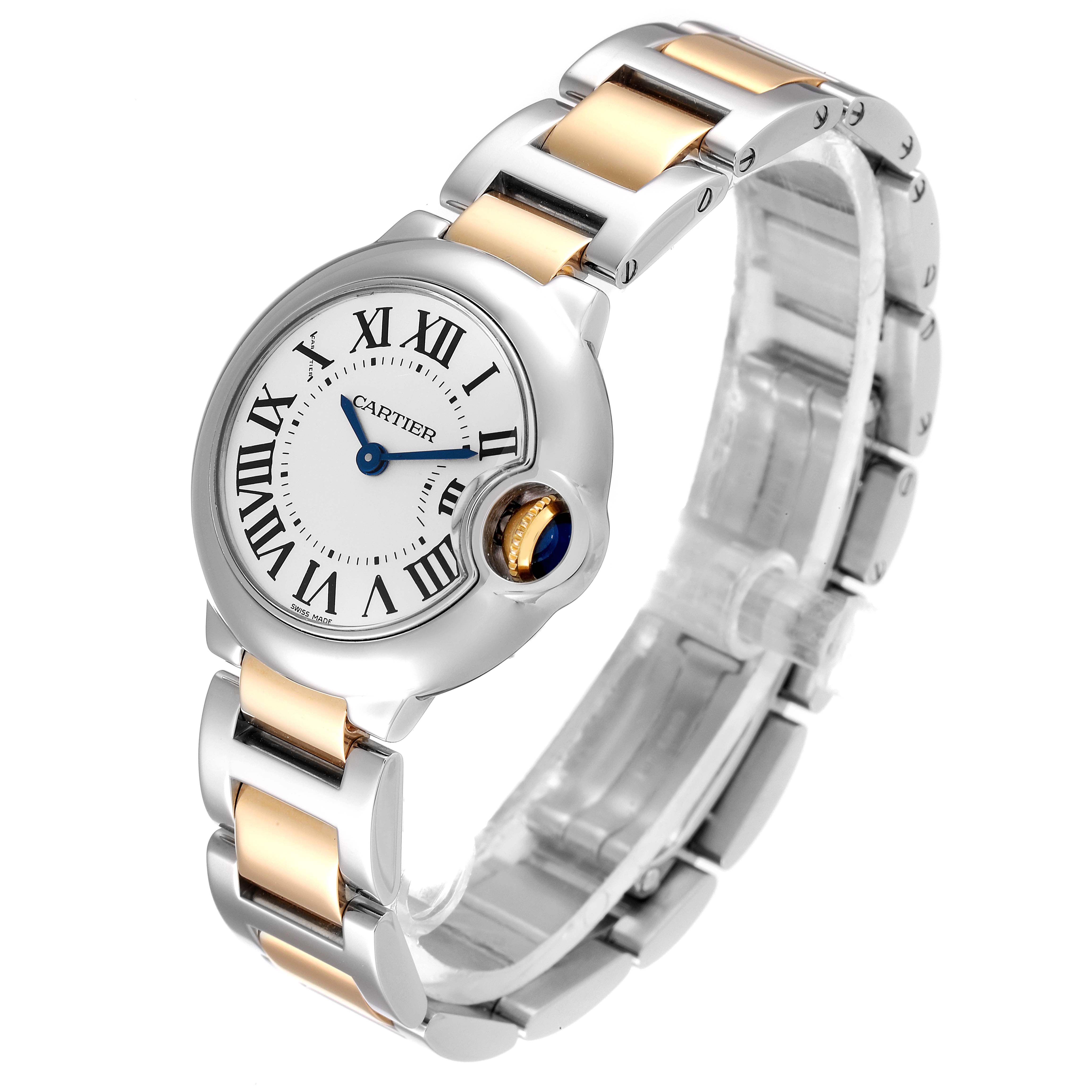 This image shows a close-up, angled view of a Ballon Bleu model by Cartier, featuring its watch face and metallic strap.