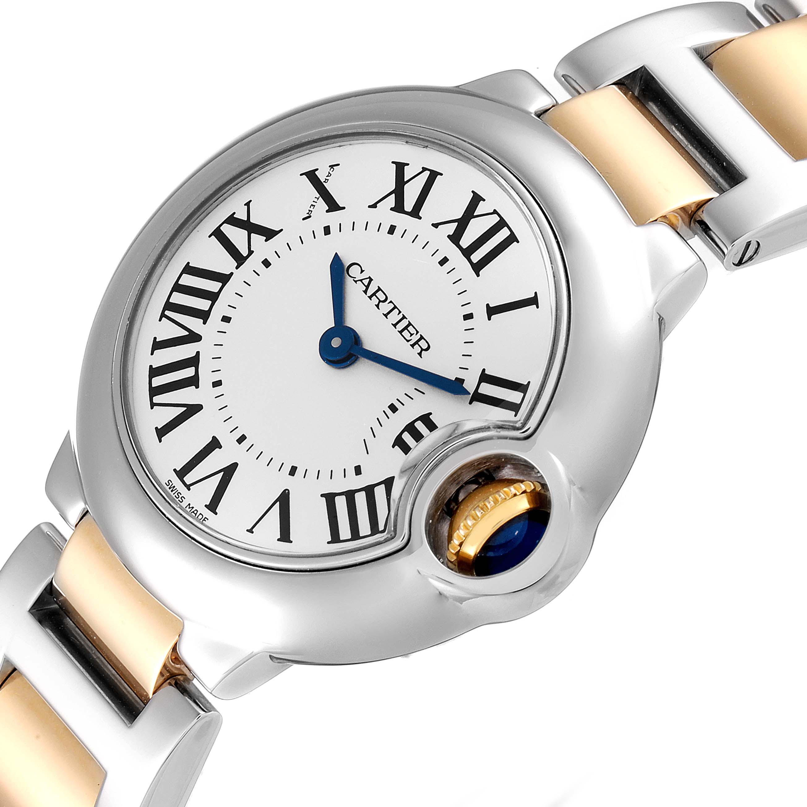 The image shows a close-up view of the Cartier Ballon Bleu W2BB0010 Women
s Steel and Gold (two tone) Silver Dial W2BB0010 Women
s Steel and Gold (two tone) Silver Dial watch, highlighting its face, Roman numerals, and part of the metal band.