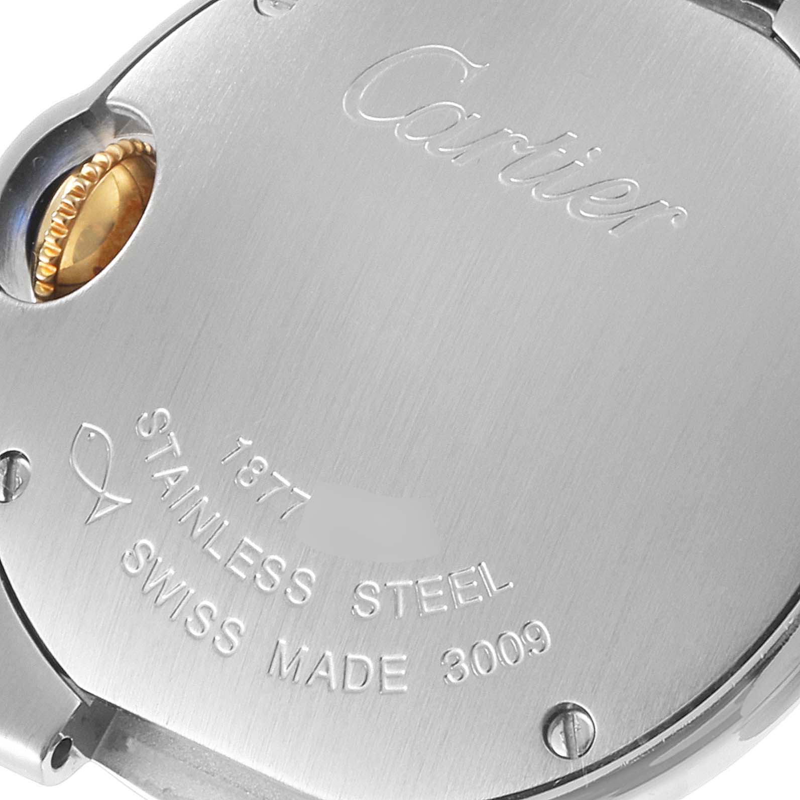 The image shows the back case and part of the crown of a Ballon Bleu de Cartier watch, displaying the brand engraving and materials.