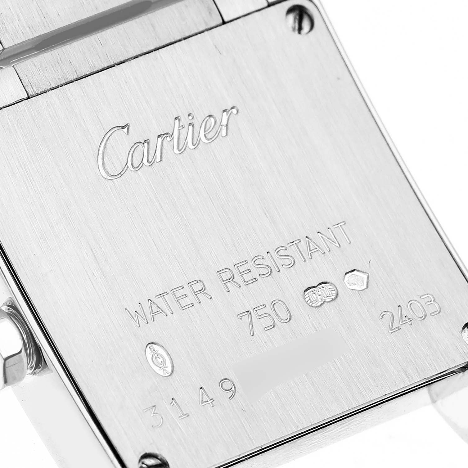 The image shows the case back of a Cartier Tank Francaise W50012S3 Women's White Gold Silver Dial W50012S3 Women's White Gold Silver Dial watch, featuring engravings with brand details and specifications.