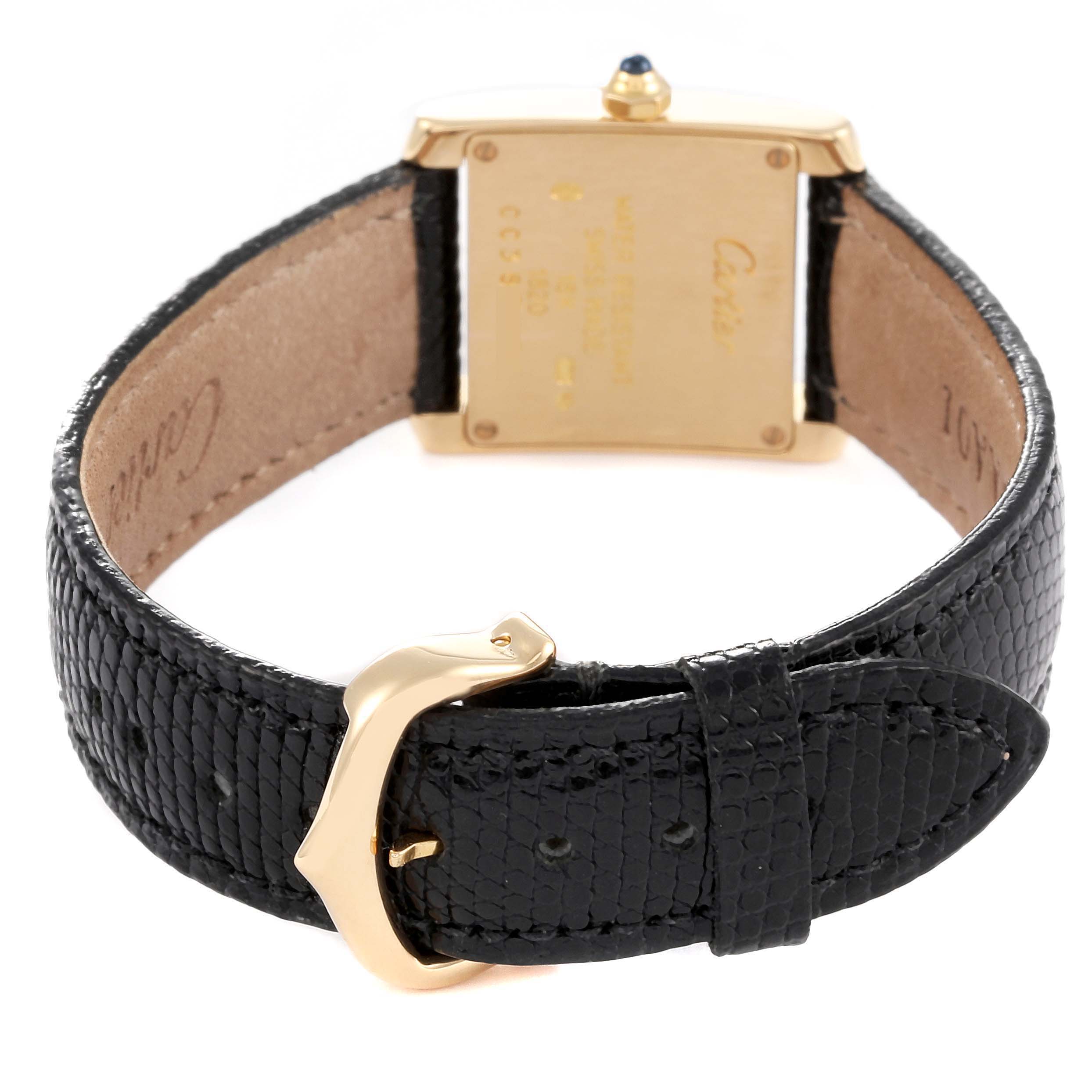 This image shows the Tank Francaise model by Cartier from the back, highlighting its leather strap and buckle.