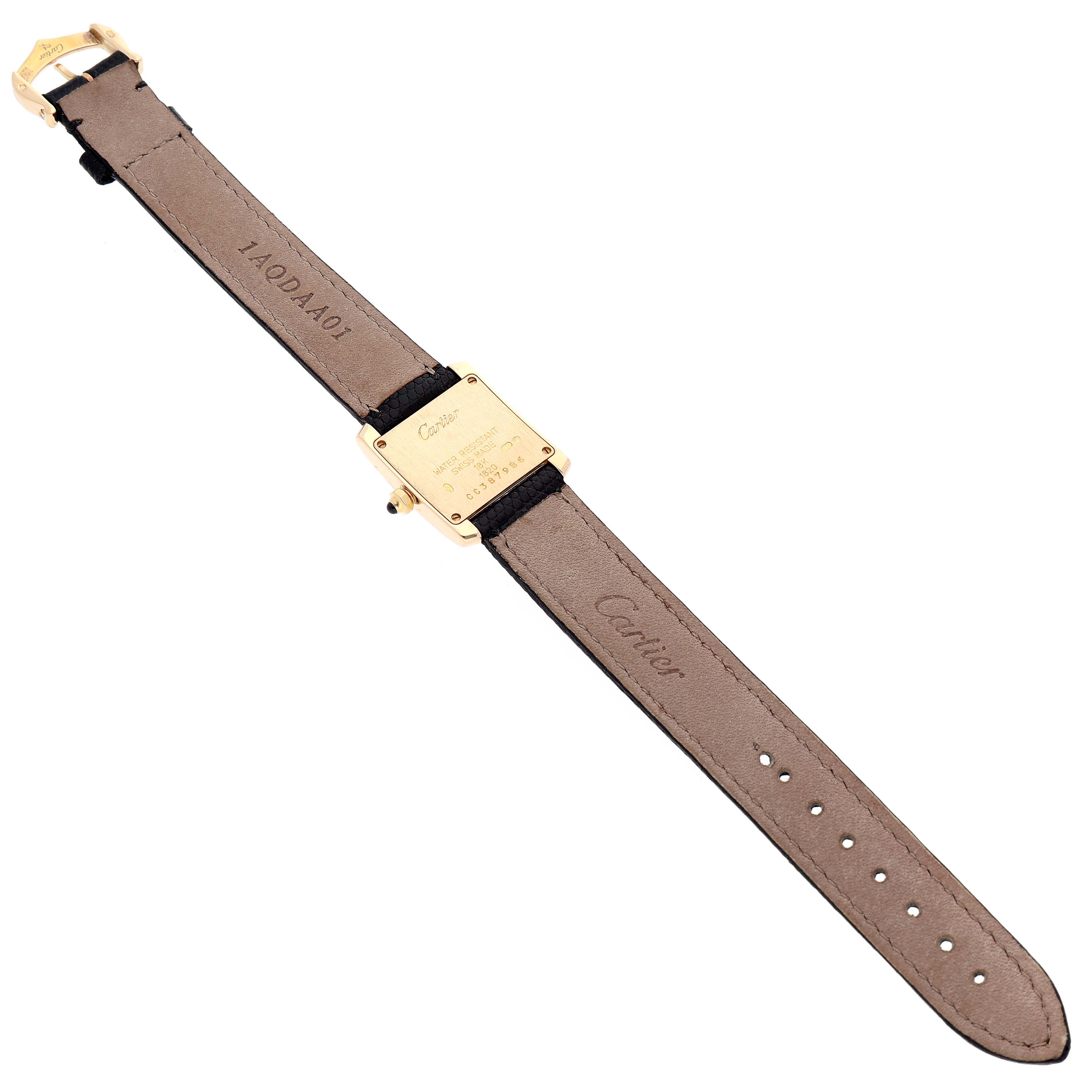 The image shows the back of a Cartier Tank Francaise W5000256 Women's Yellow Gold Silver Dial W5000256 Women's Yellow Gold Silver Dial watch, showcasing the watch strap and case back.