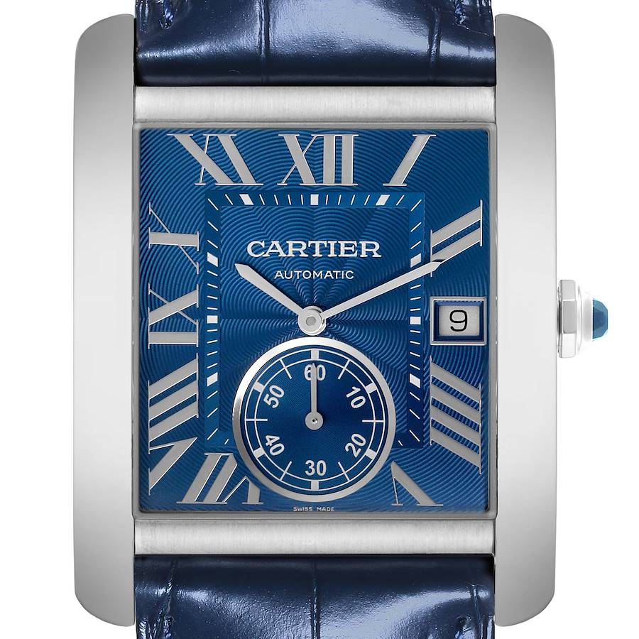 The Cartier Tank MC watch is shown from a top view, displaying the blue dial, Roman numerals, date window, and leather strap.