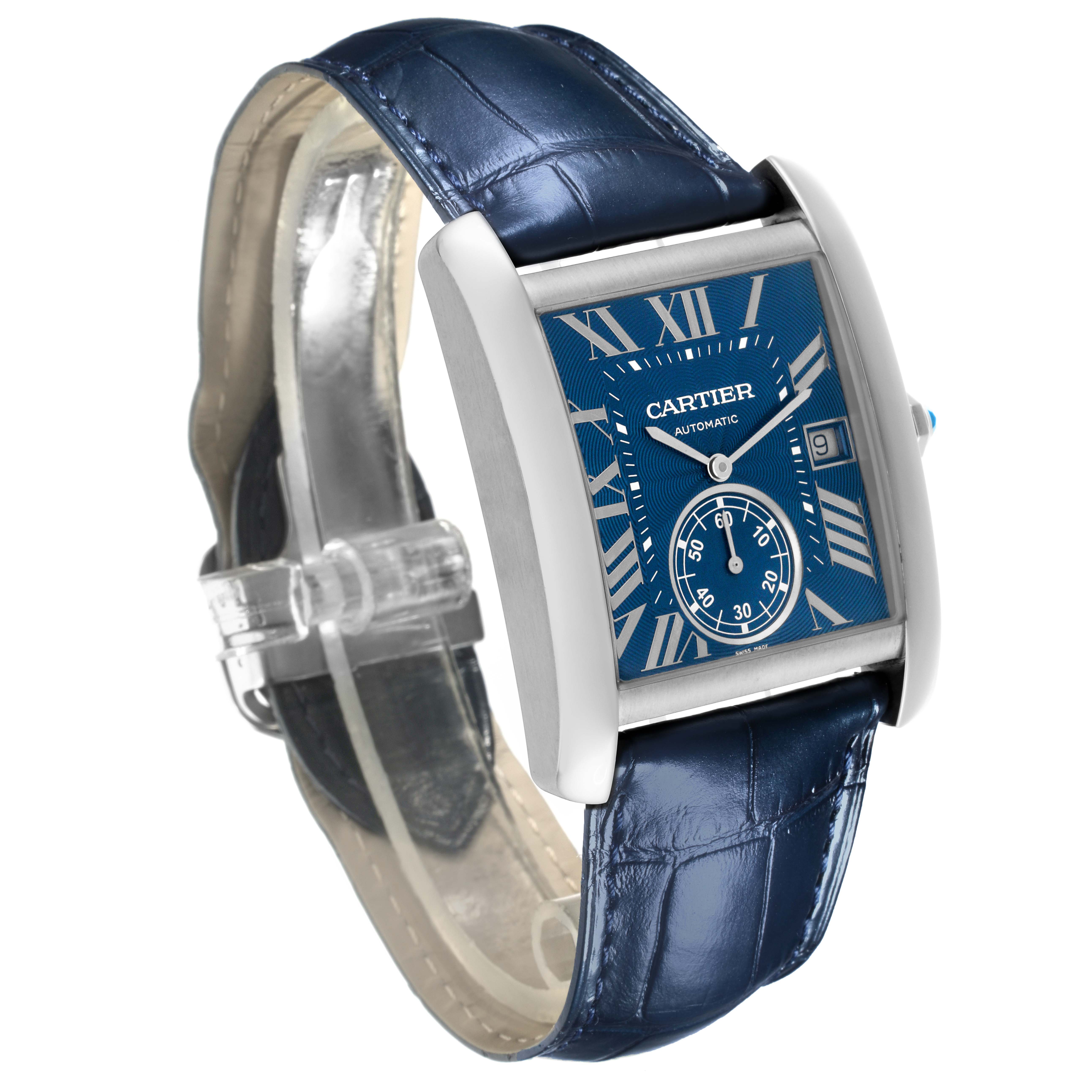The Cartier Tank MC WSTA0010 Men's Stainless Steel Blue Dial WSTA0010 Men's Stainless Steel Blue Dial watch is shown at a slightly tilted angle, highlighting the blue dial, Roman numerals, subdial, and blue leather strap.