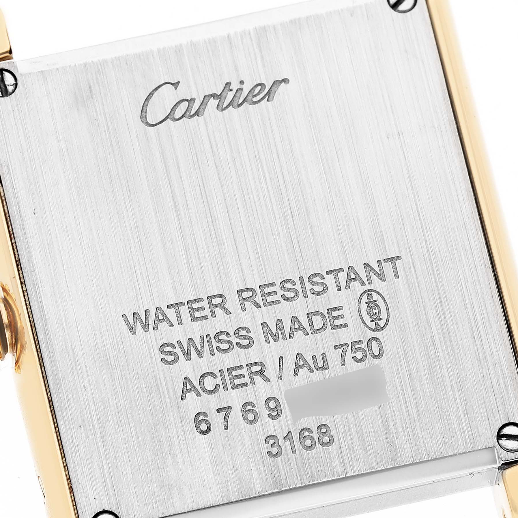 This image shows the back case of the Cartier Tank Solo W5200002 Women
s Steel and Gold (two tone) Silver Dial W5200002 Women
s Steel and Gold (two tone) Silver Dial watch, featuring inscriptions about its water resistance and materials.