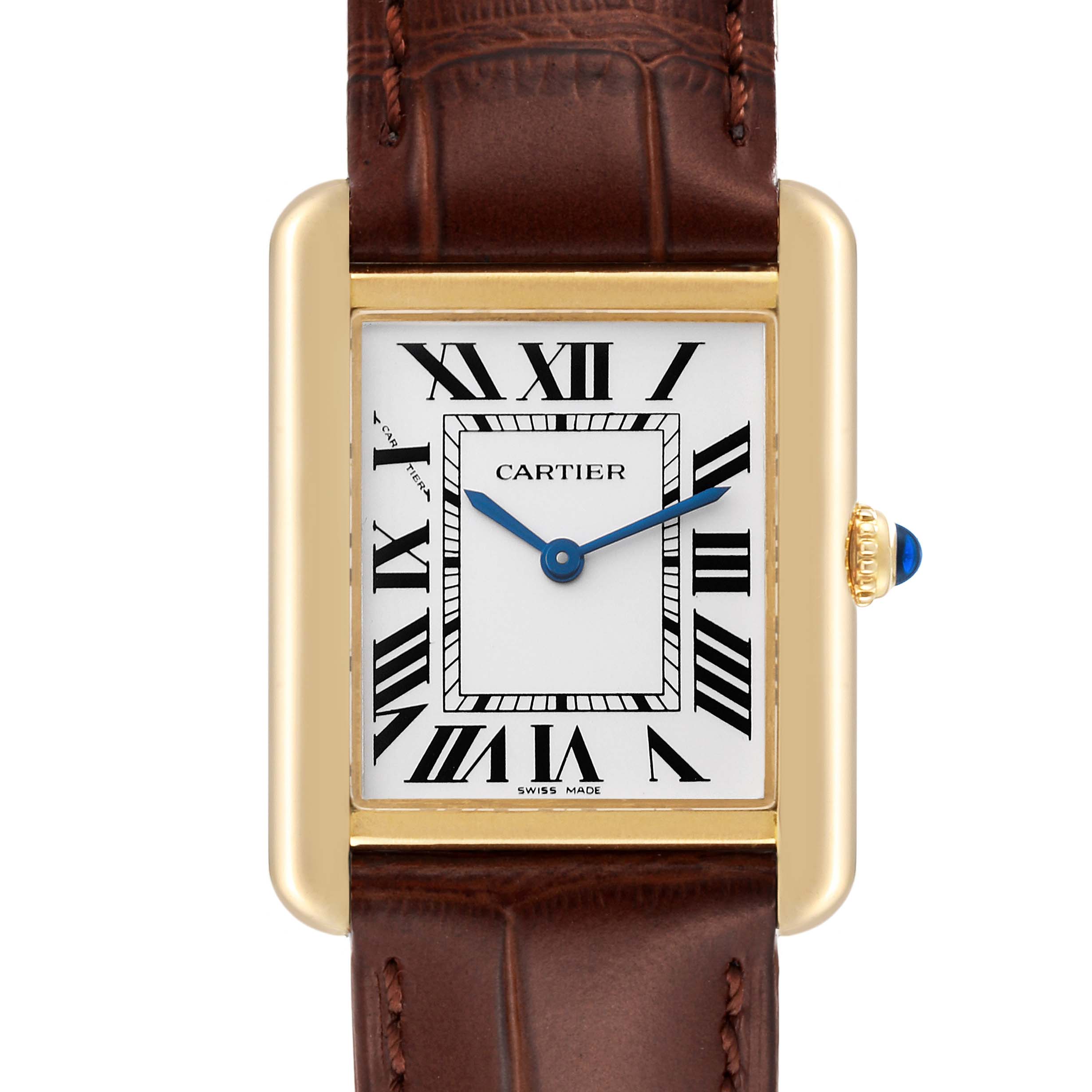 This is a frontal view of the Cartier Tank Solo W5200002 Women
s Steel and Gold (two tone) Silver Dial W5200002 Women
s Steel and Gold (two tone) Silver Dial watch, showing the dial, Roman numeral markers, blue hands, and part of the brown leather strap.