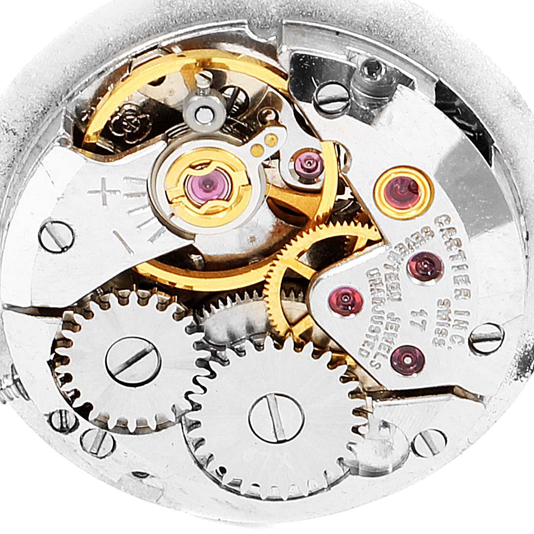 This image shows a close-up of the inner mechanical components of a Cartier Vendome W15071G8 Women's White Gold White Dial W15071G8 Women's White Gold White Dial watch.