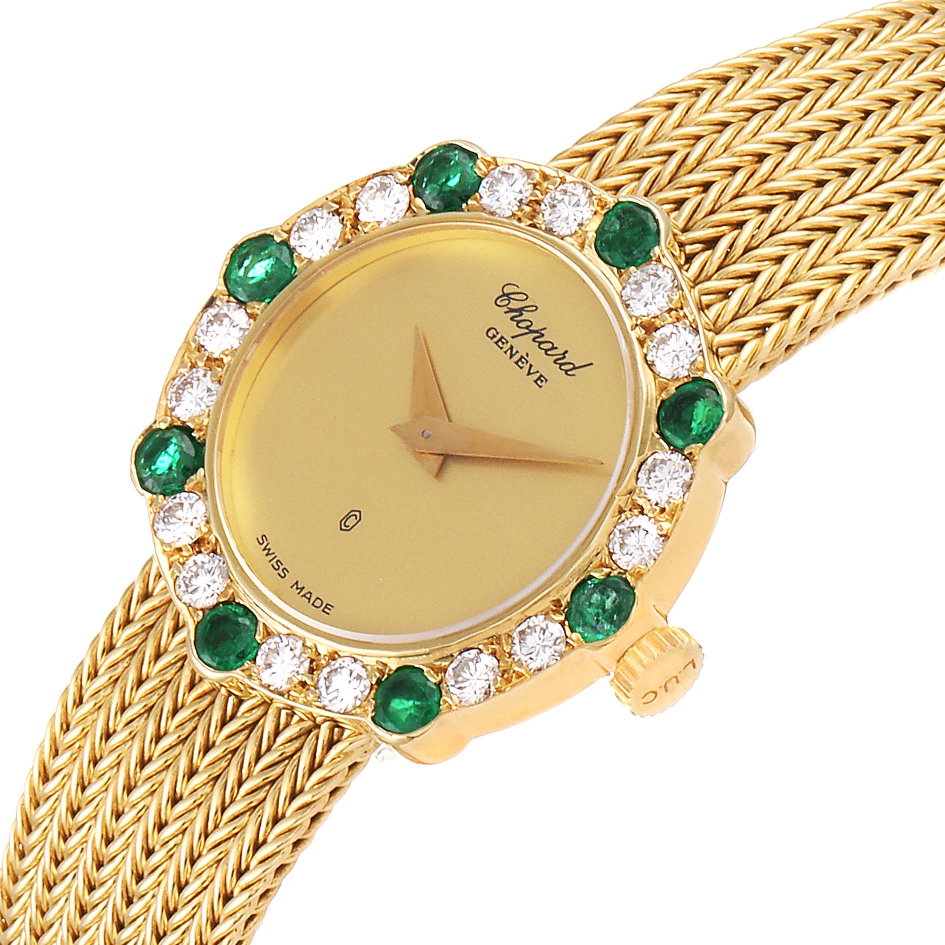 The image shows the Chopard 4057 Women's Yellow Gold Champagne Dial 4057 Women's Yellow Gold Champagne Dial 4057 model watch from an oblique angle, highlighting its 18K yellow gold case, emerald, and diamond accents.