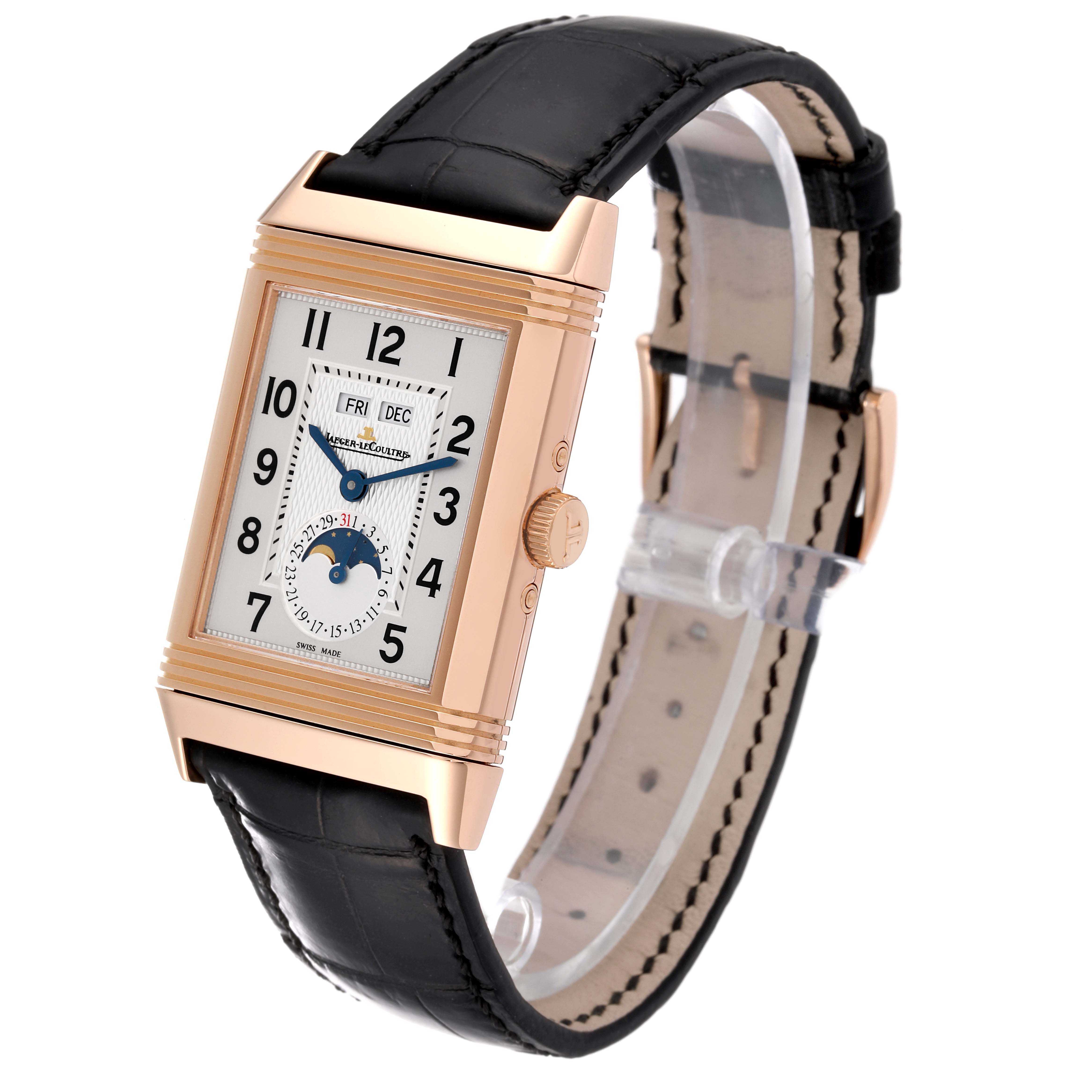 The Jaeger LeCoultre Reverso Q3752520 Men's Rose Gold Silver Dial Q3752520 Men's Rose Gold Silver Dial watch is shown at an angle, displaying its rectangular face, black leather strap, and side crown.