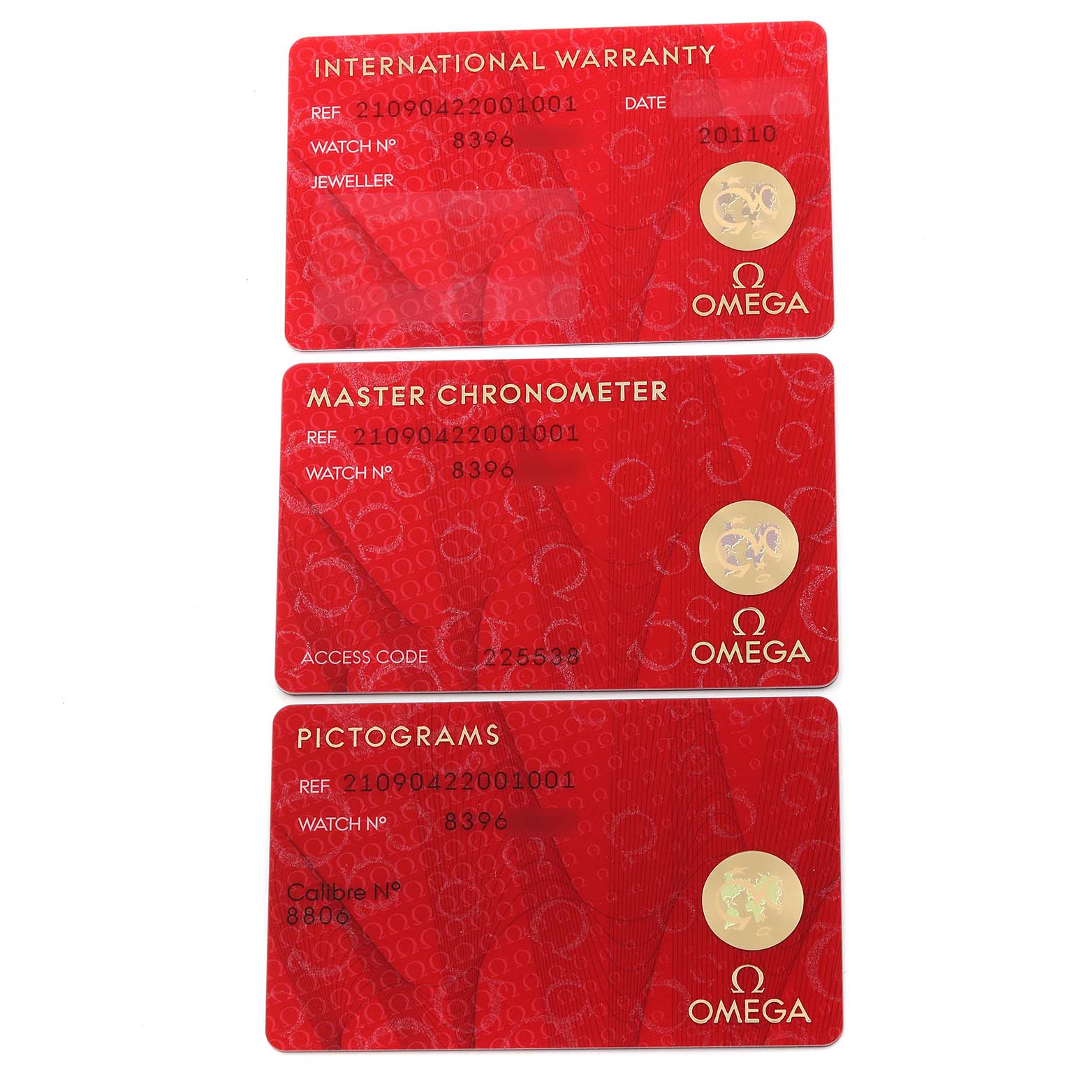 The image shows three Omega Seamaster 210.90.42.20.01.001 Men's Titanium Brown Dial 210.90.42.20.01.001 Men's Titanium Brown Dial International Warranty, Master Chronometer, and Pictograms cards.