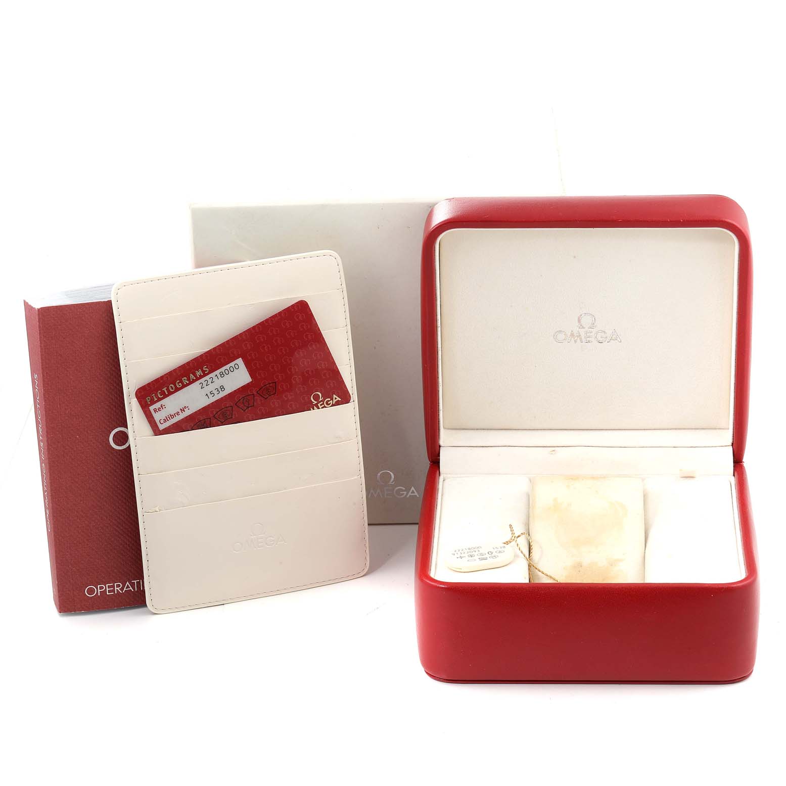 This image shows the accessories of an Omega Seamaster 2221.80.00 Men's Stainless Steel Blue Dial 2221.80.00 Men's Stainless Steel Blue Dial watch, including its box, a cardholder with a red card, and an operation manual.