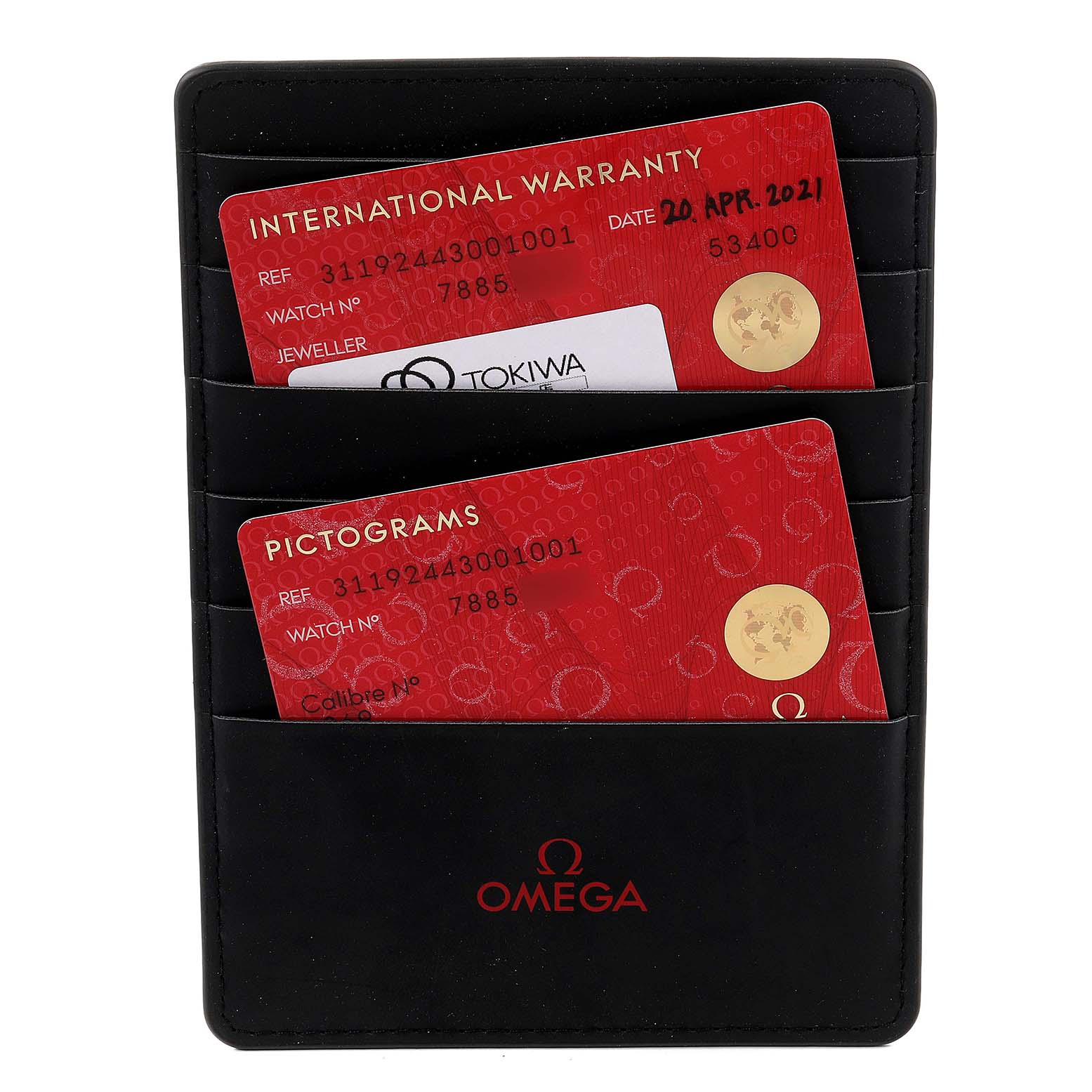 This image shows the international warranty and pictograms cards for the Omega Speedmaster 311.92.44.30.01.001 Men's Ceramic Black Dial 311.92.44.30.01.001 Men's Ceramic Black Dial, stored in a black Omega cardholder.