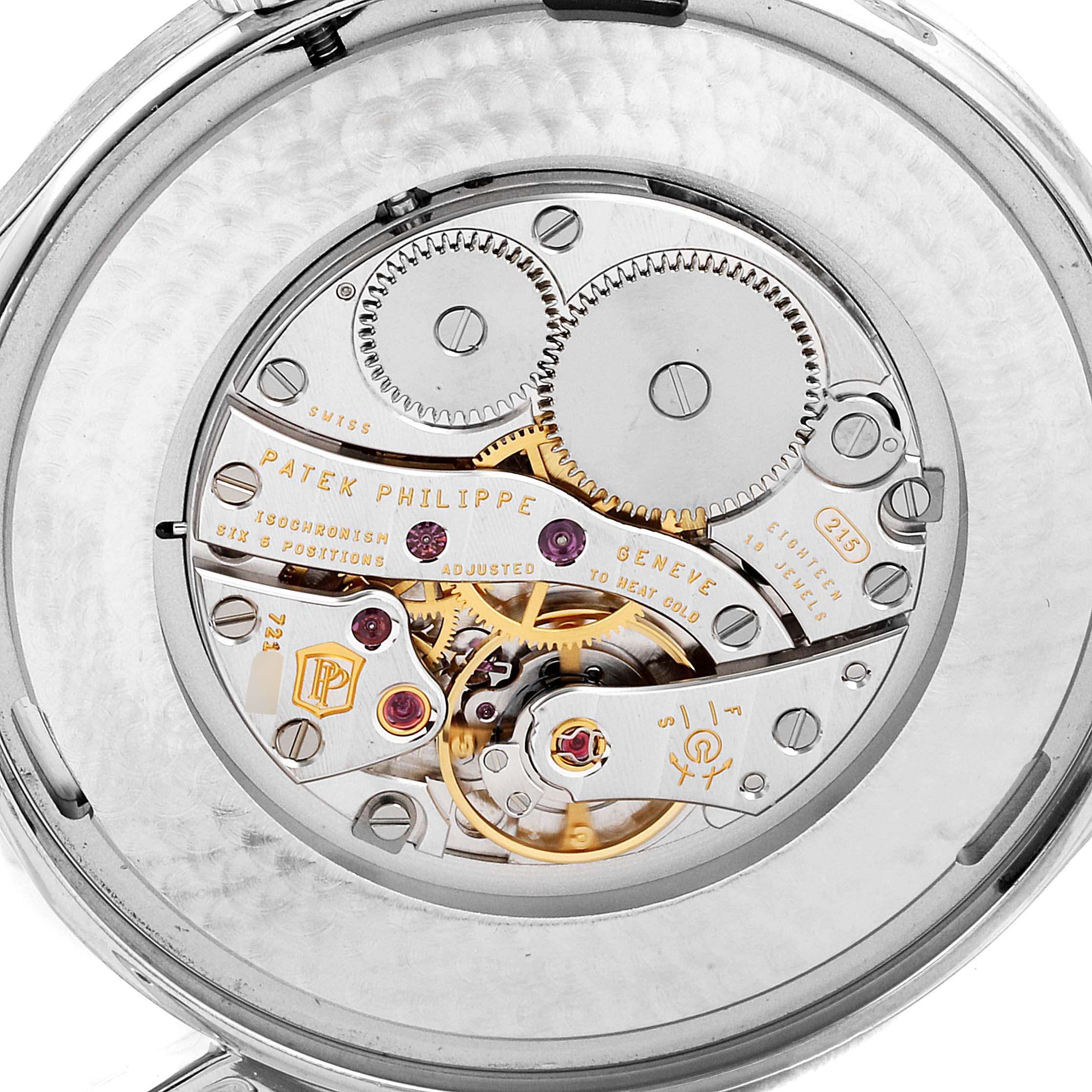 The image shows the intricate movement mechanism of a Patek Philippe Calatrava 5196G Men's White Gold Silver Dial 5196G Men's White Gold Silver Dial watch from a back angle.
