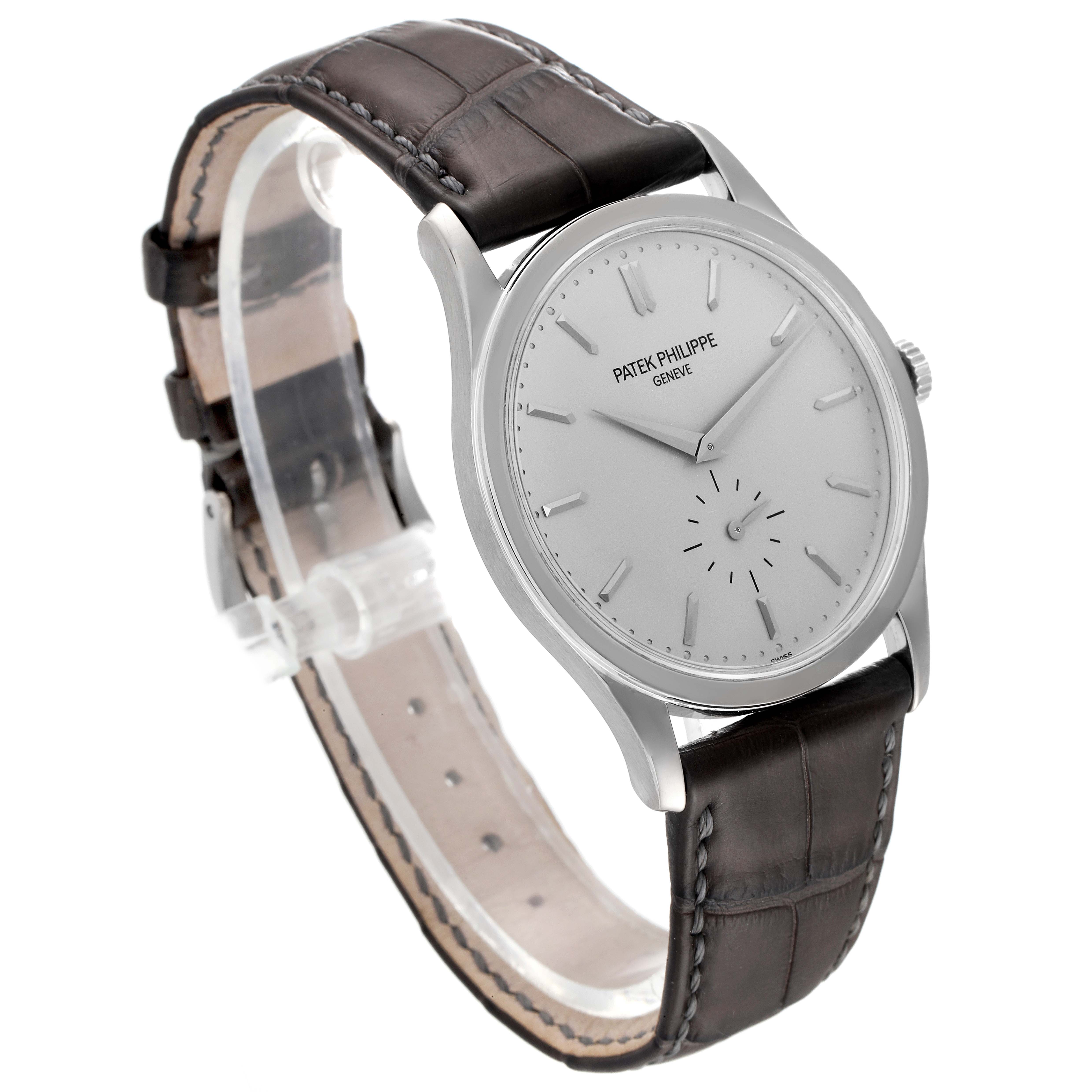 The image shows a Patek Philippe Calatrava 5196G Men's White Gold Silver Dial 5196G Men's White Gold Silver Dial watch at a slight angle, highlighting its face, leather strap, and side profile.