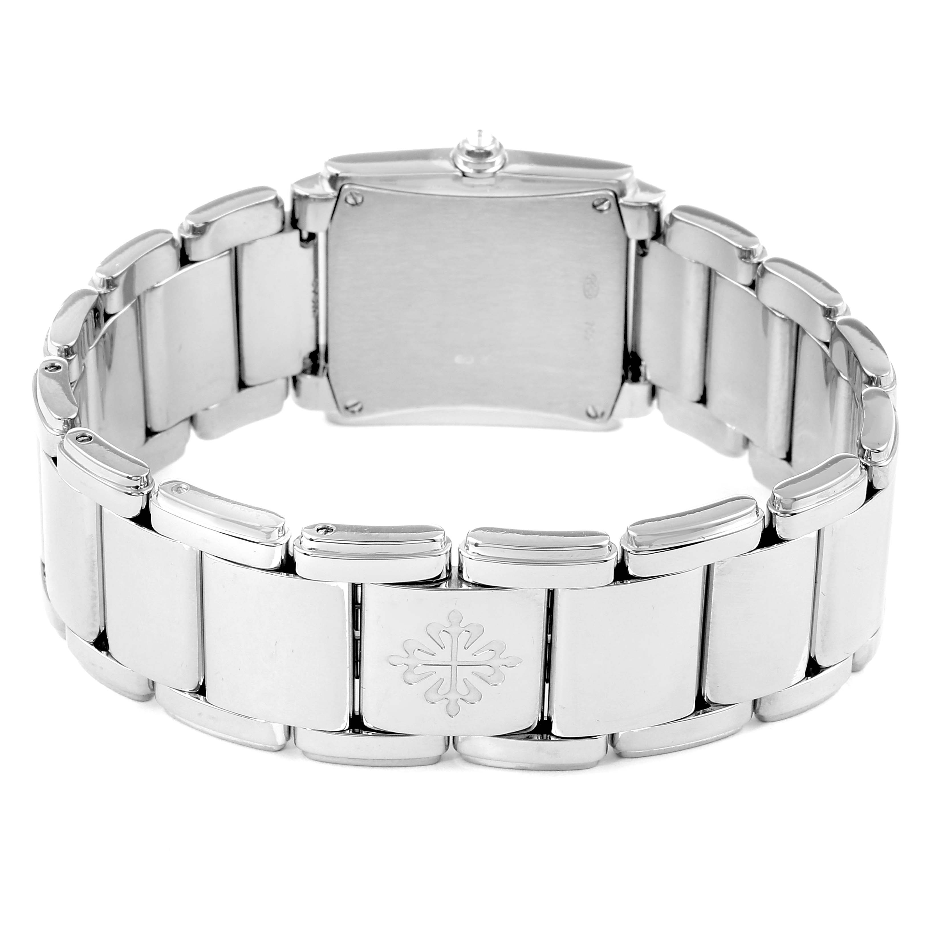 The image shows the back of a Patek Philippe Twenty-4 4908/310G-011 Women's White Gold Silver Dial 4908/310G-011 Women's White Gold Silver Dial watch, highlighting its clasp and bracelet links.