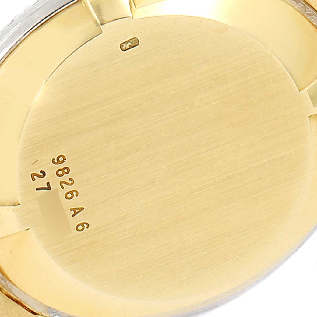 The image shows the back case of the Piaget 9826-A-6 Women's Yellow Gold Brown Dial 9826-A-6 Women's Yellow Gold Brown Dial 9826 Yellow Gold Diamond Tiger Eye Vintage Cocktail Ladies Watch.