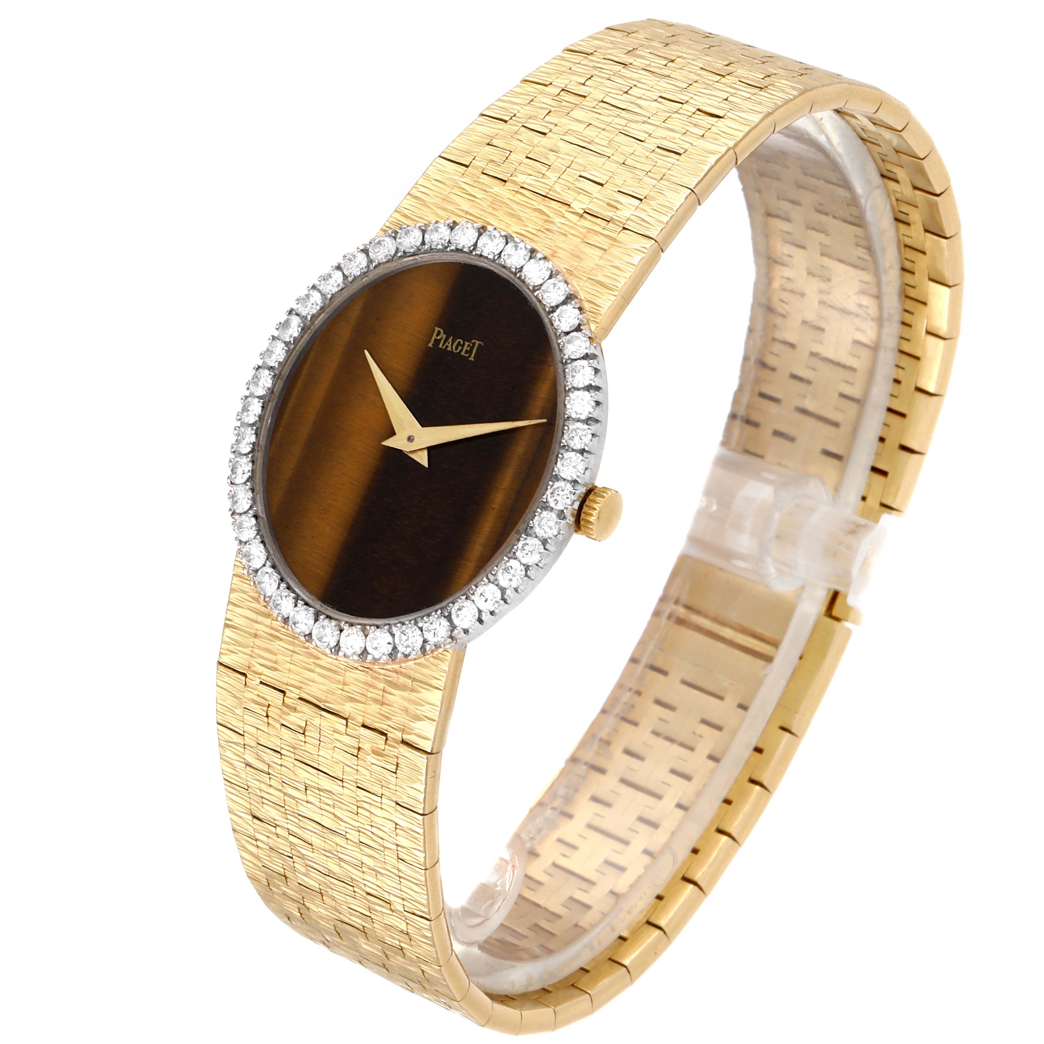 This image shows the Piaget 9826-A-6 Women's Yellow Gold Brown Dial 9826-A-6 Women's Yellow Gold Brown Dial 9826 Yellow Gold Diamond Tiger Eye Vintage Cocktail Ladies Watch at an angle highlighting the face and band.