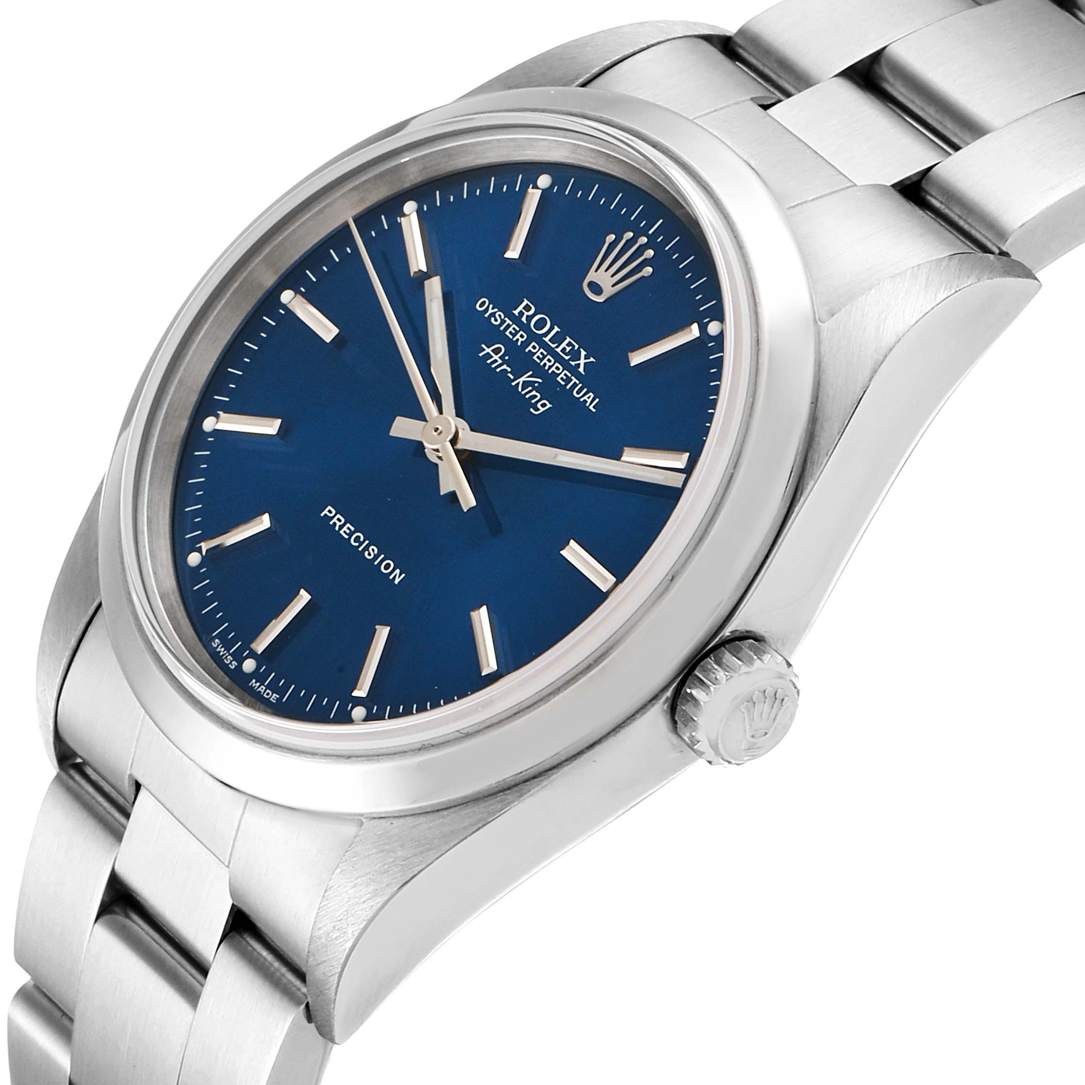 This image shows a side angle view of a Rolex Air-King 14000M Men's Stainless Steel Blue Dial 14000M Men's Stainless Steel Blue Dial watch, featuring its dial, crown, and bracelet.