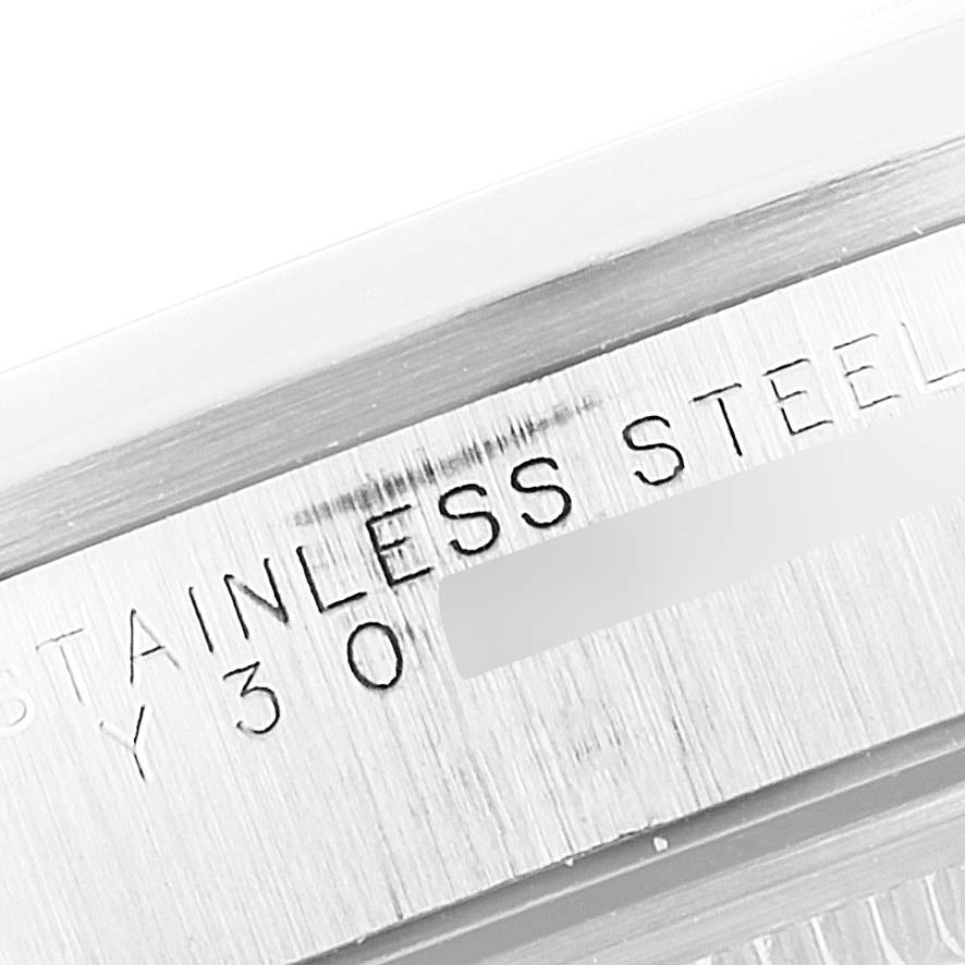 The image shows a close-up of the case back of a Rolex Air-King 14000M Men's Stainless Steel Blue Dial 14000M Men's Stainless Steel Blue Dial, highlighting the stainless steel material.