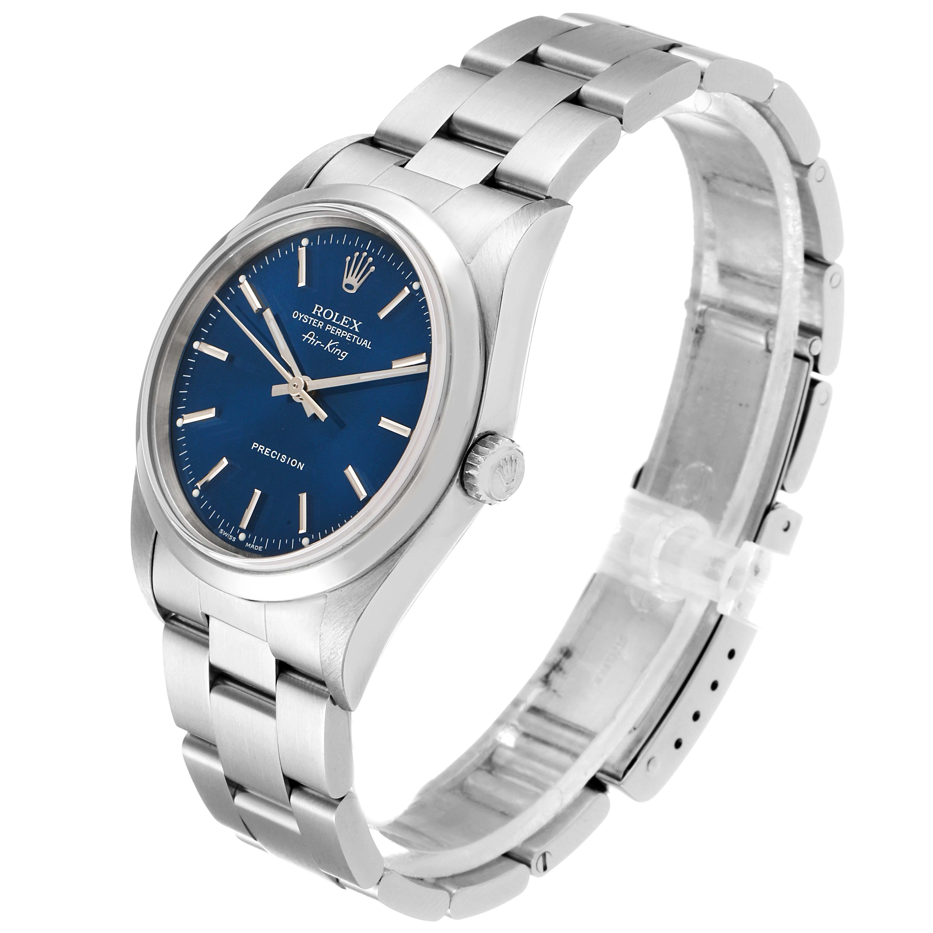 The Rolex Air-King 14000M Men's Stainless Steel Blue Dial 14000M Men's Stainless Steel Blue Dial watch is shown at a three-quarter angle, highlighting the face, bracelet, and crown.