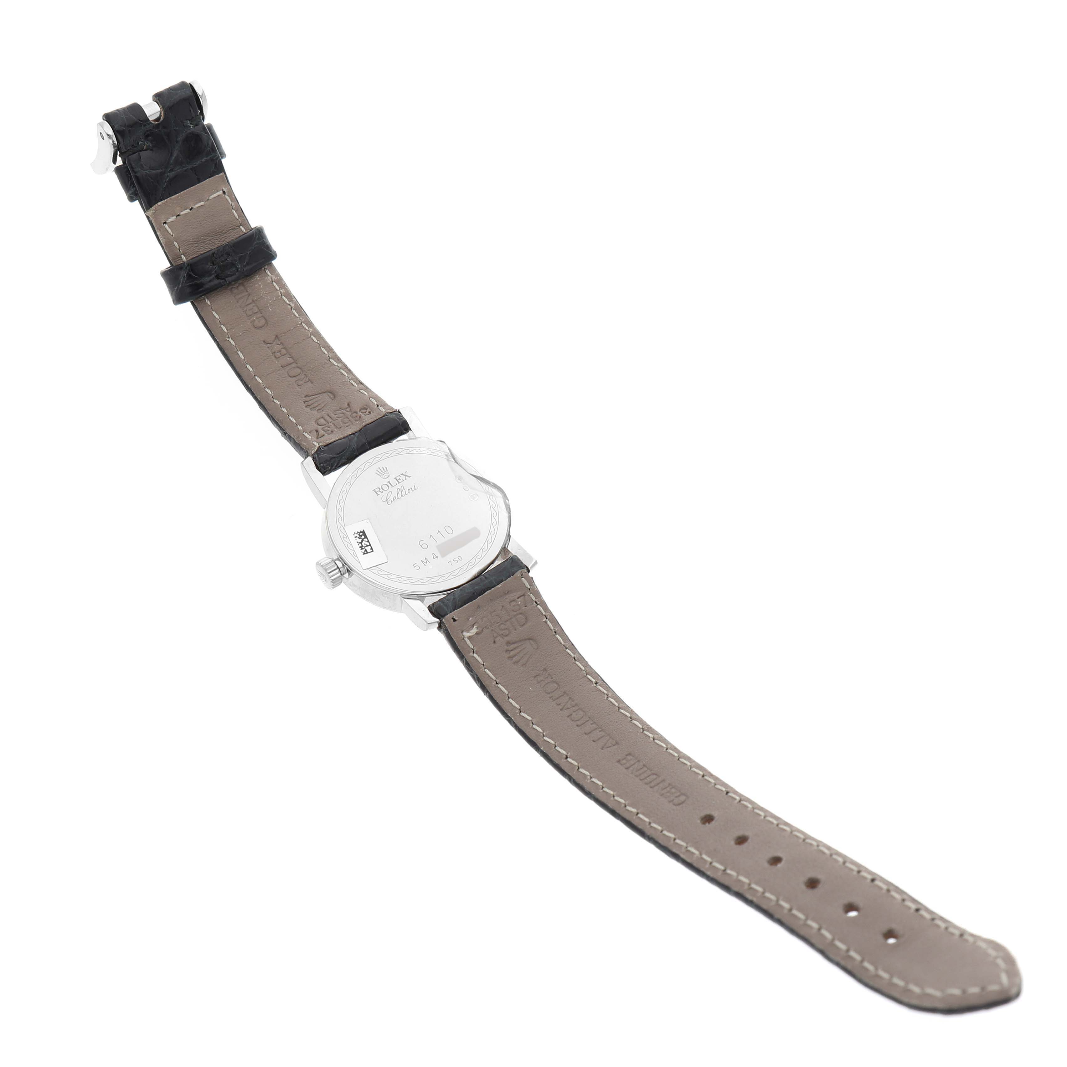 The image shows the back and the strap of a Rolex Cellini 6110/9 Women's White Gold White Dial 6110/9 Women's White Gold White Dial watch, with the watch case and stitching details visible.