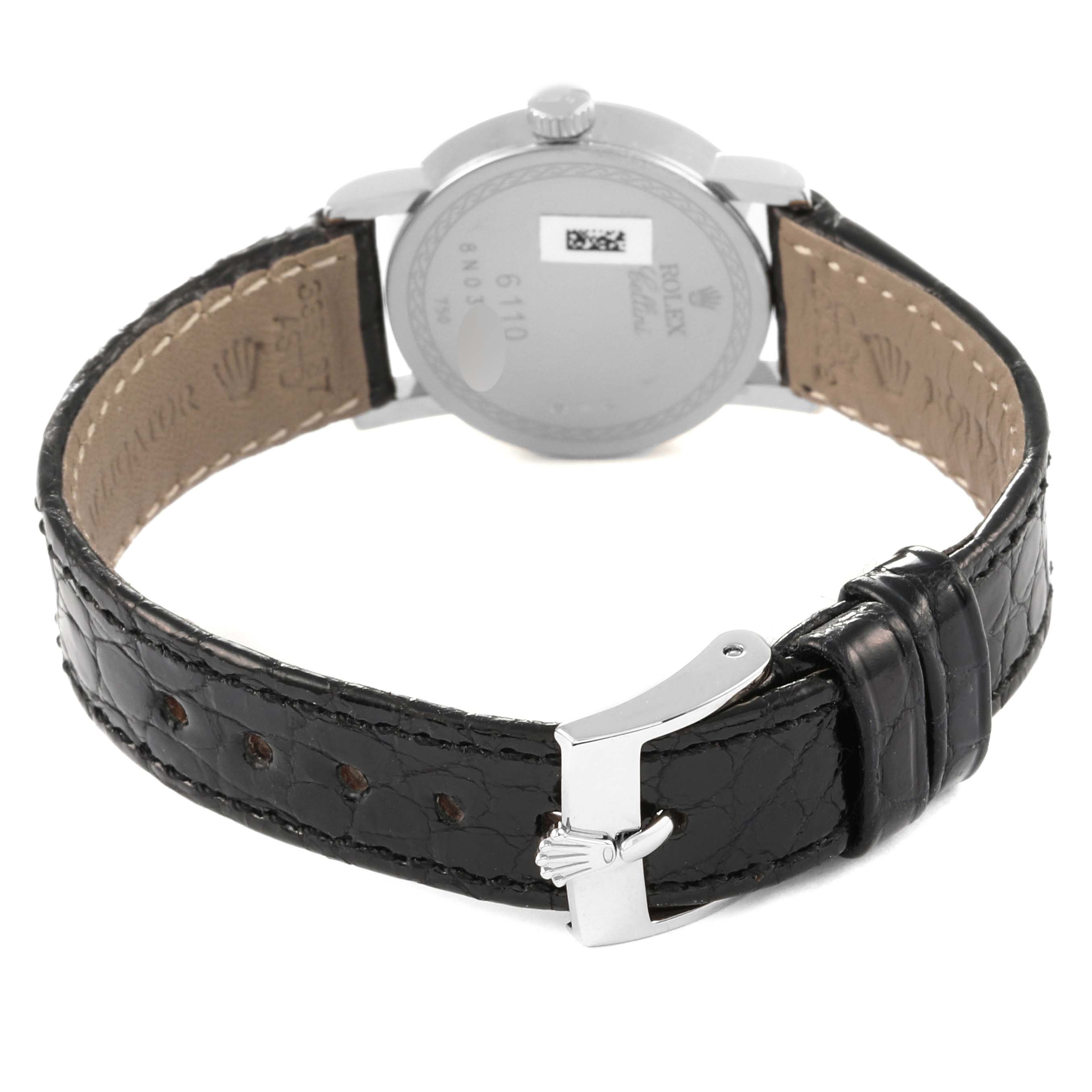 The image shows the back view of a Rolex Cellini 6110/9 Women's White Gold White Dial 6110/9 Women's White Gold White Dial watch, highlighting the case back and leather strap with a clasp.