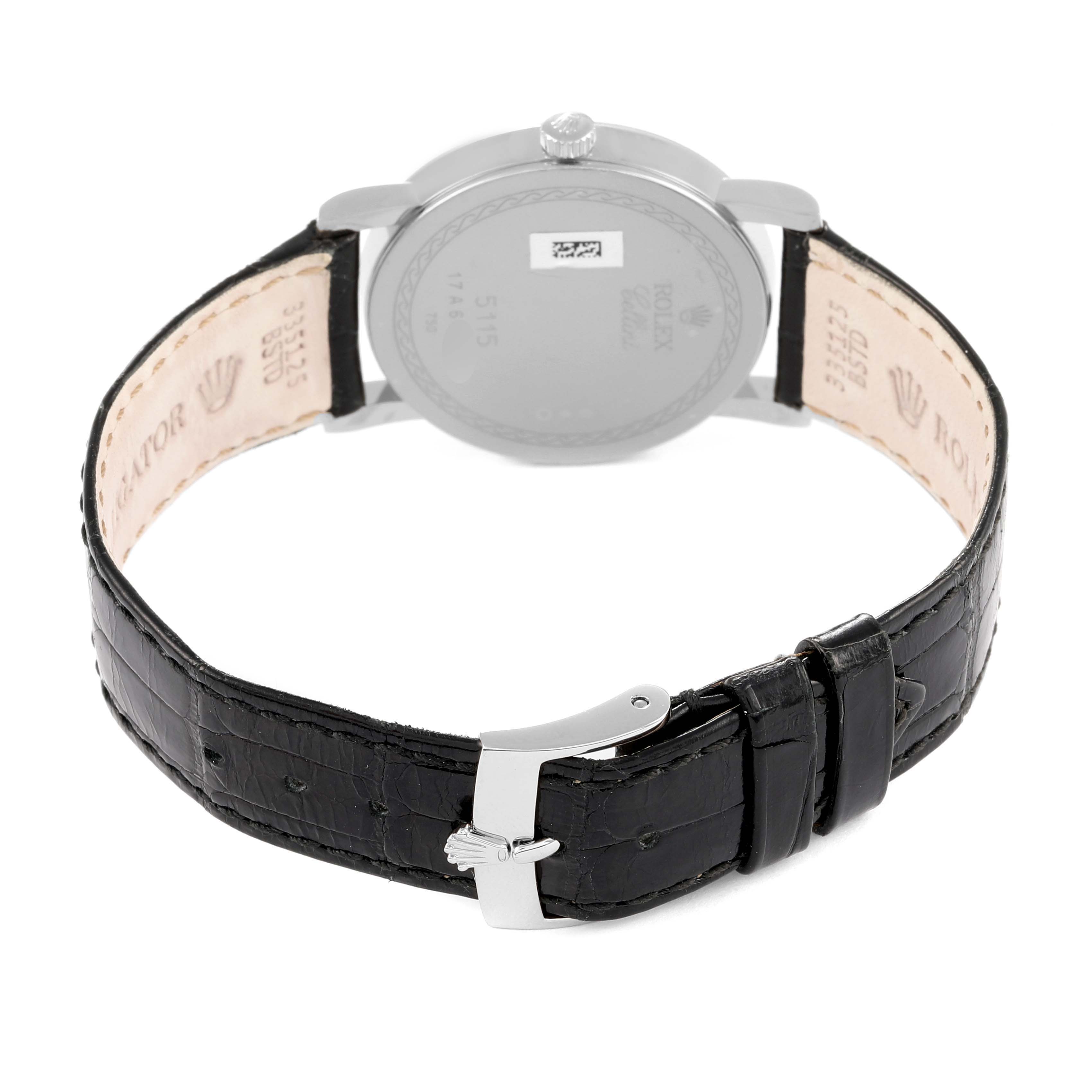 The image shows the back and strap of a Rolex Cellini 5115/9 Men
s White Gold Silver Dial 5115/9 Men
s White Gold Silver Dial watch, highlighting its clasp and leather band.