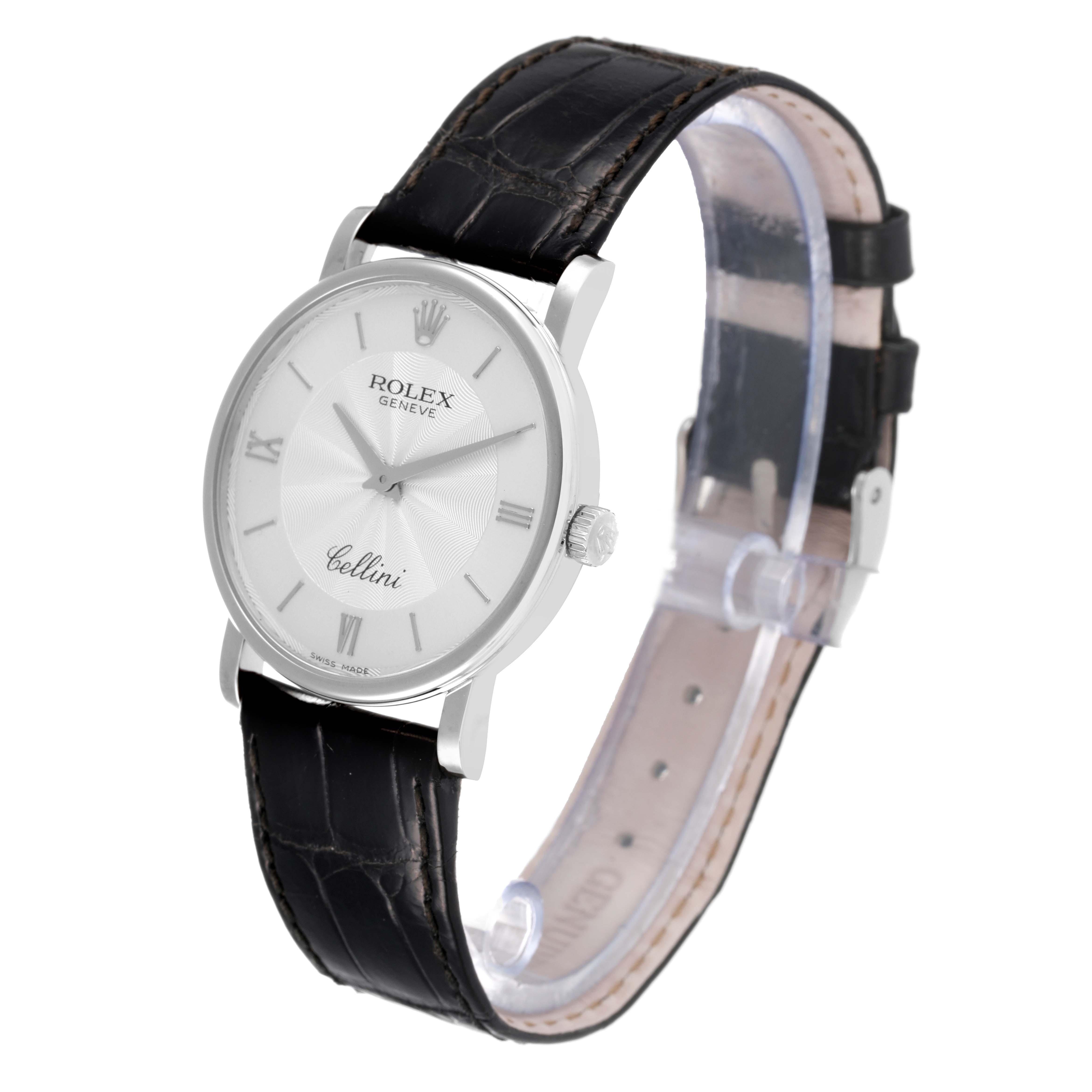 The Rolex Cellini 5115/9 Men
s White Gold Silver Dial 5115/9 Men
s White Gold Silver Dial watch is shown at a slight angle, displaying its face, crown, and black leather strap.