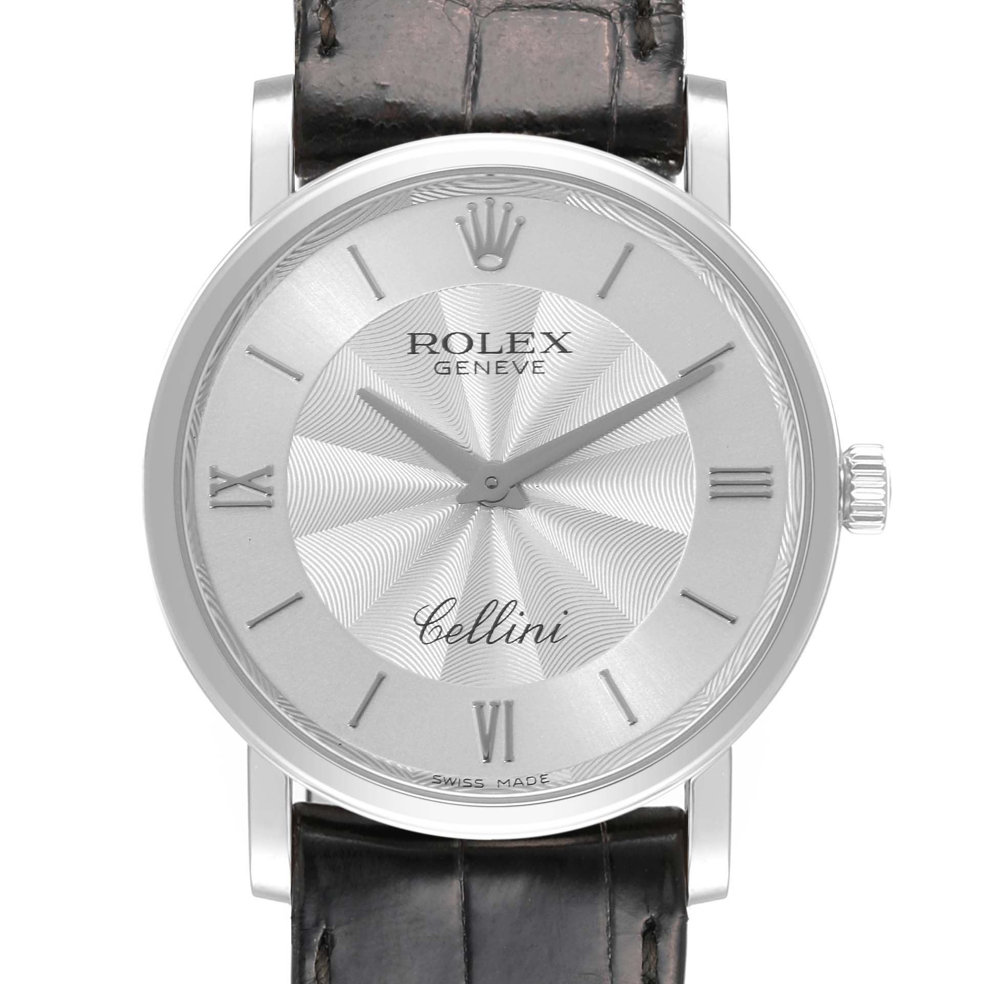 The image shows a front view of the Rolex Cellini 5115/9 Men
s White Gold Silver Dial 5115/9 Men
s White Gold Silver Dial watch, highlighting its dial, hands, Roman numerals, and part of the leather strap.