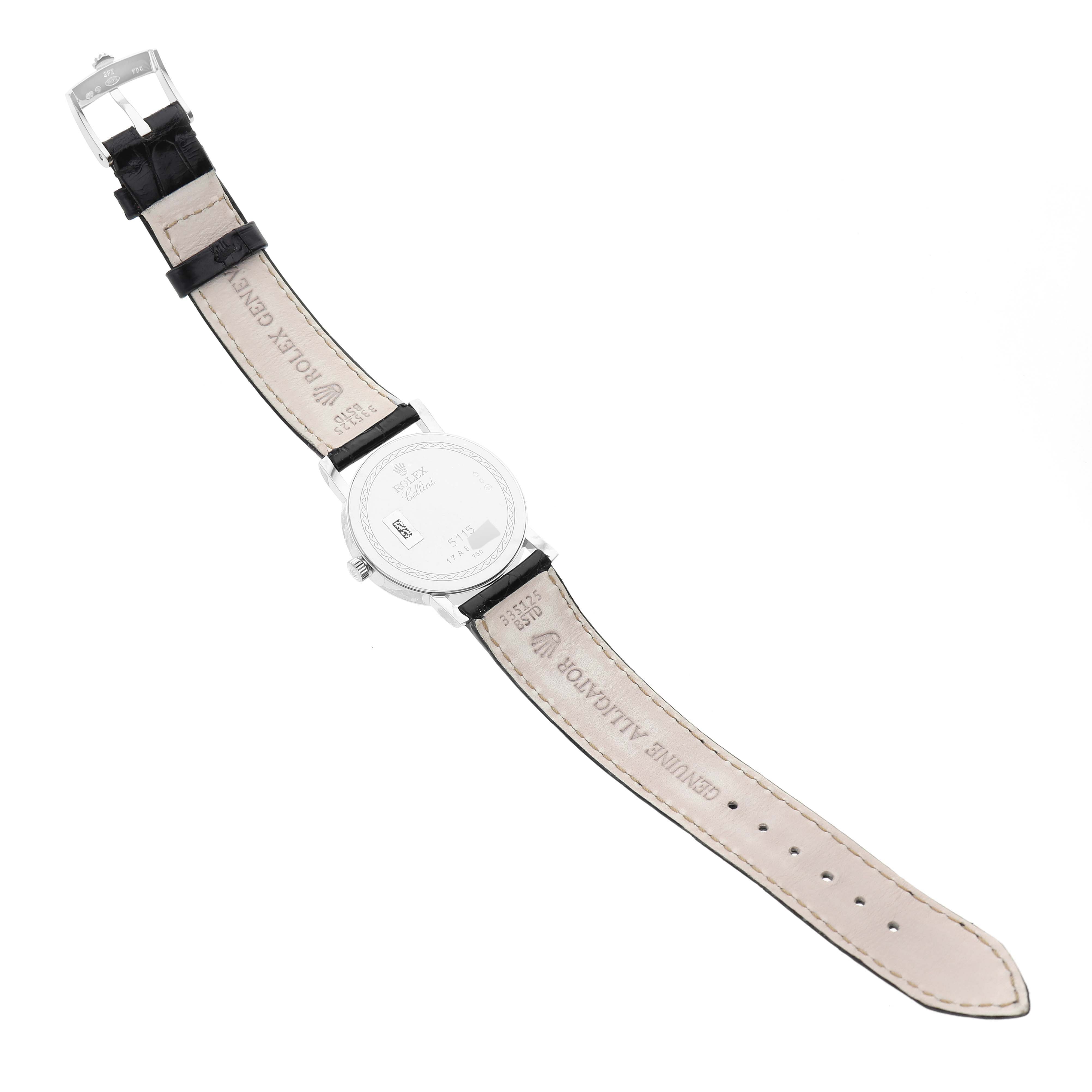 The image shows the back of a Rolex Cellini 5115/9 Men
s White Gold Silver Dial 5115/9 Men
s White Gold Silver Dial watch, including the back case, leather strap, and buckle.