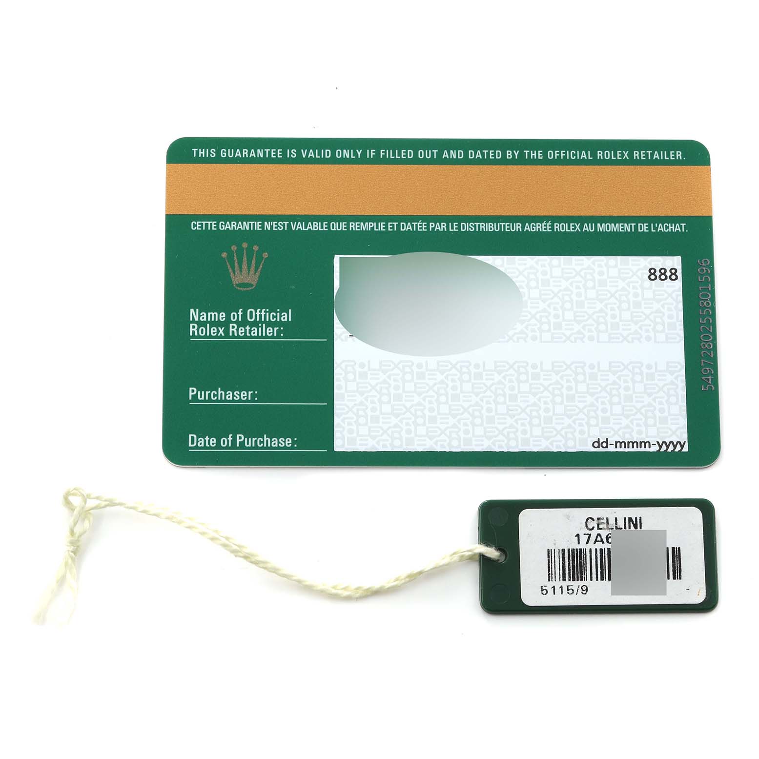 The image shows the guarantee card and tag for a Rolex Cellini 5115/9 Men
s White Gold Silver Dial 5115/9 Men
s White Gold Silver Dial watch, taken from a top-down angle.