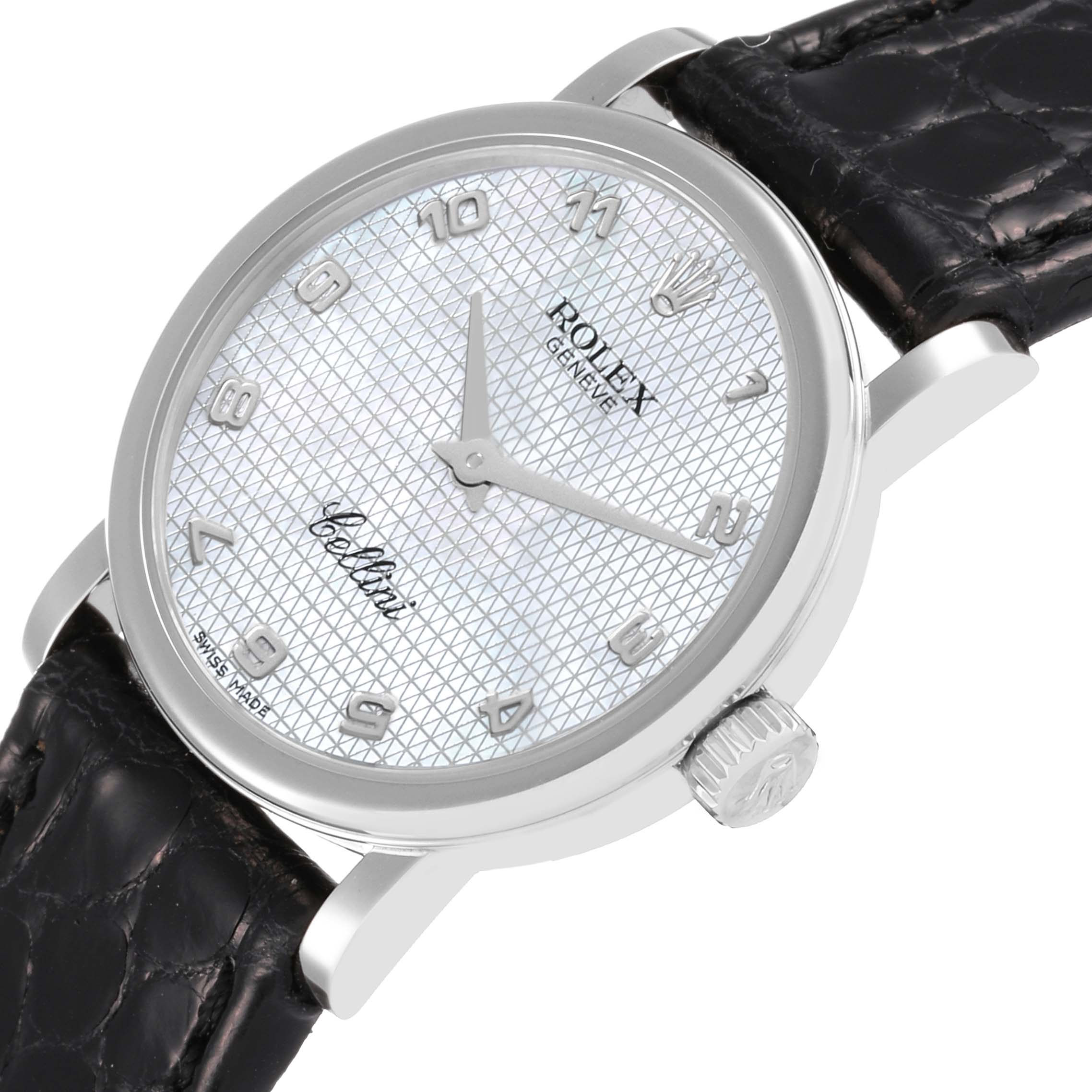 The Rolex Cellini 6110/9 Women's White Gold Mother of Pearl Dial 6110/9 Women's White Gold Mother of Pearl Dial watch is shown at a slight angle highlighting the dial, crown, and leather strap.