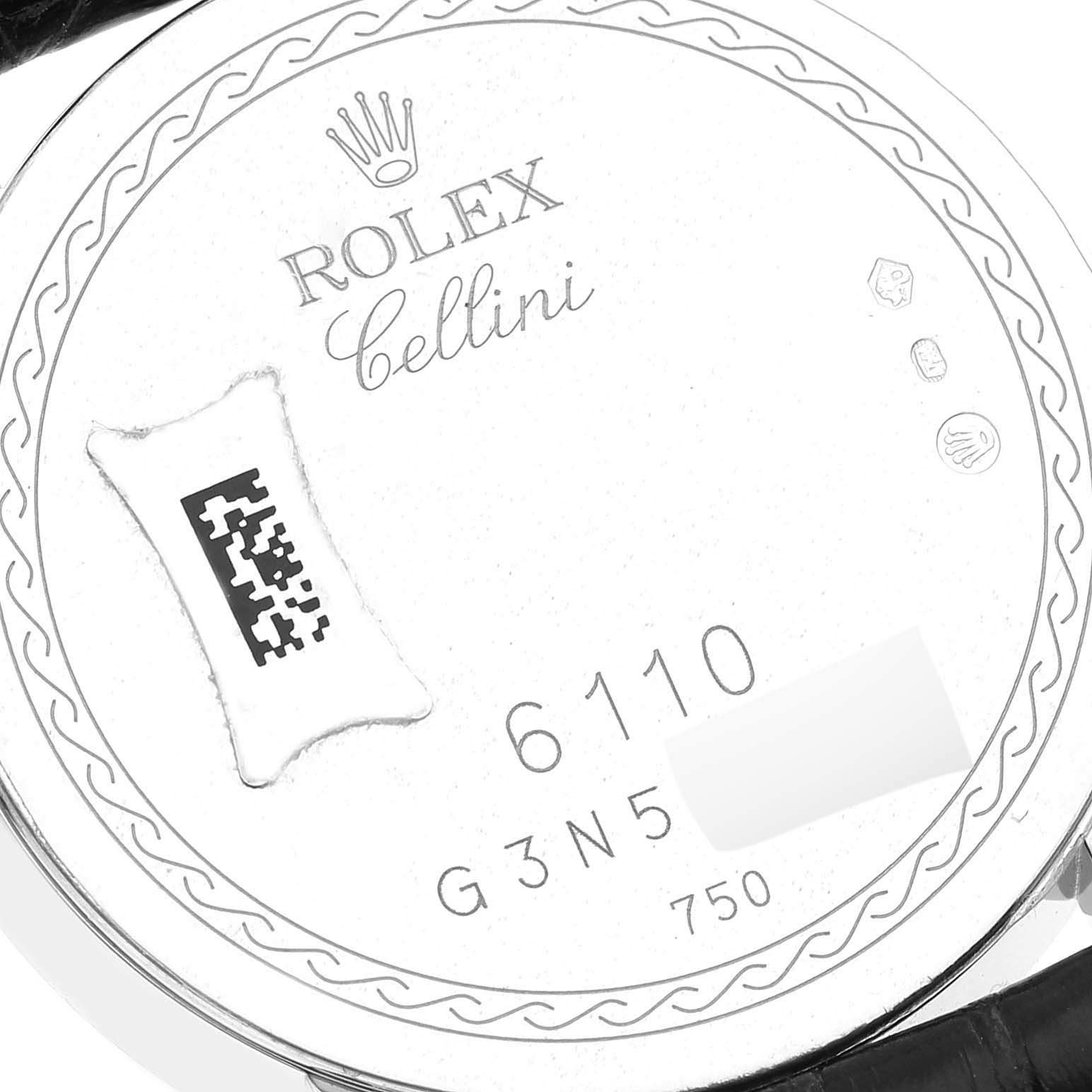 This image shows the case back of a Rolex Cellini 6110/9 Women's White Gold Mother of Pearl Dial 6110/9 Women's White Gold Mother of Pearl Dial model, featuring the brand's logo, serial number, and hallmarks.
