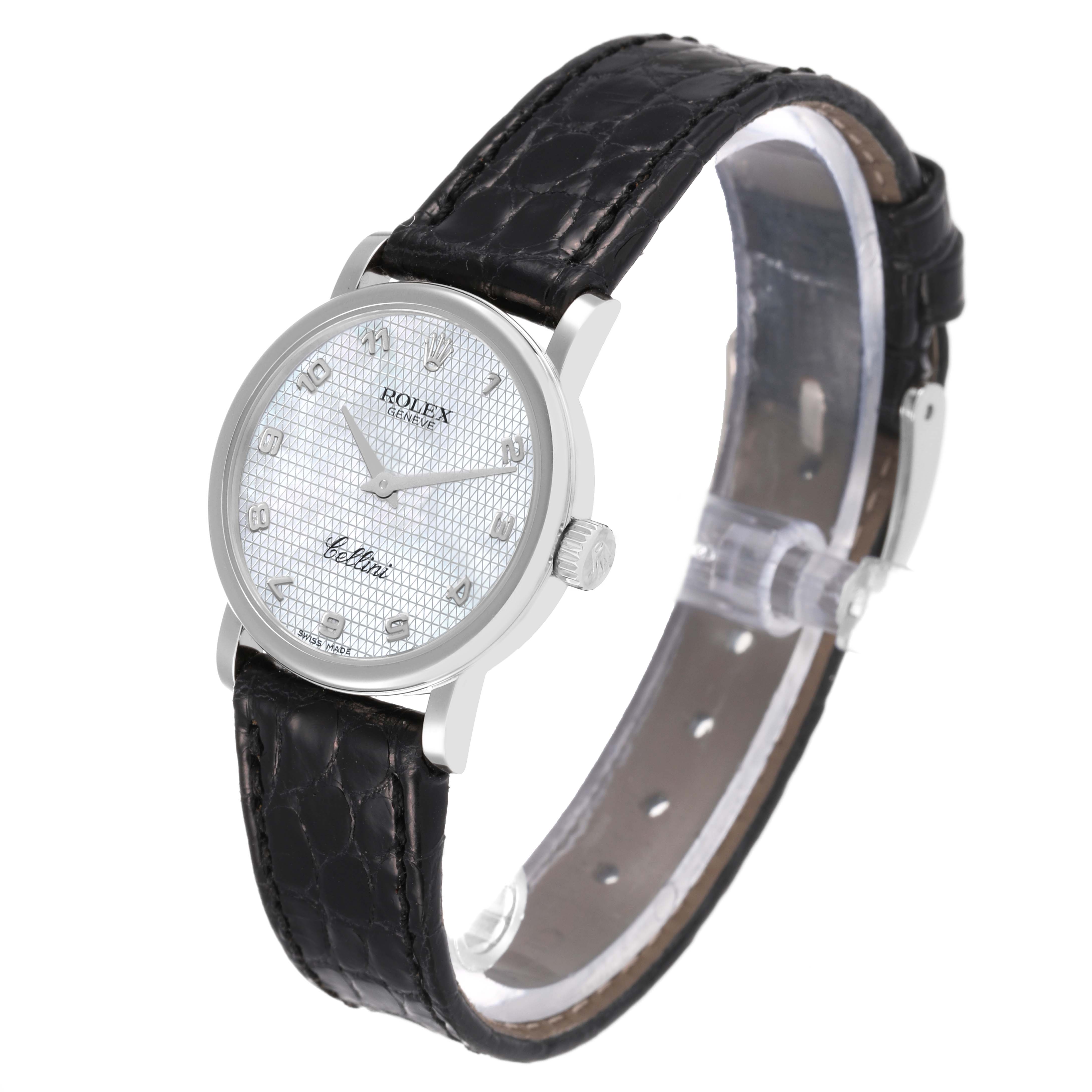 This image shows the Rolex Cellini 6110/9 Women's White Gold Mother of Pearl Dial 6110/9 Women's White Gold Mother of Pearl Dial watch from a three-quarter front angle, highlighting its dial, case, and leather strap.