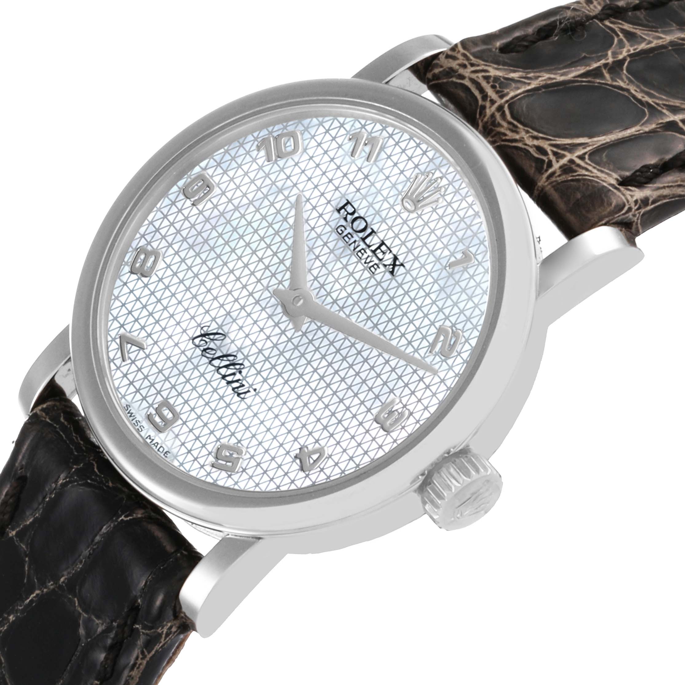 The Rolex Cellini 6110/9 Women's White Gold Mother of Pearl Dial 6110/9 Women's White Gold Mother of Pearl Dial watch is shown at an angled view, displaying the dial, crown, case, and leather strap.