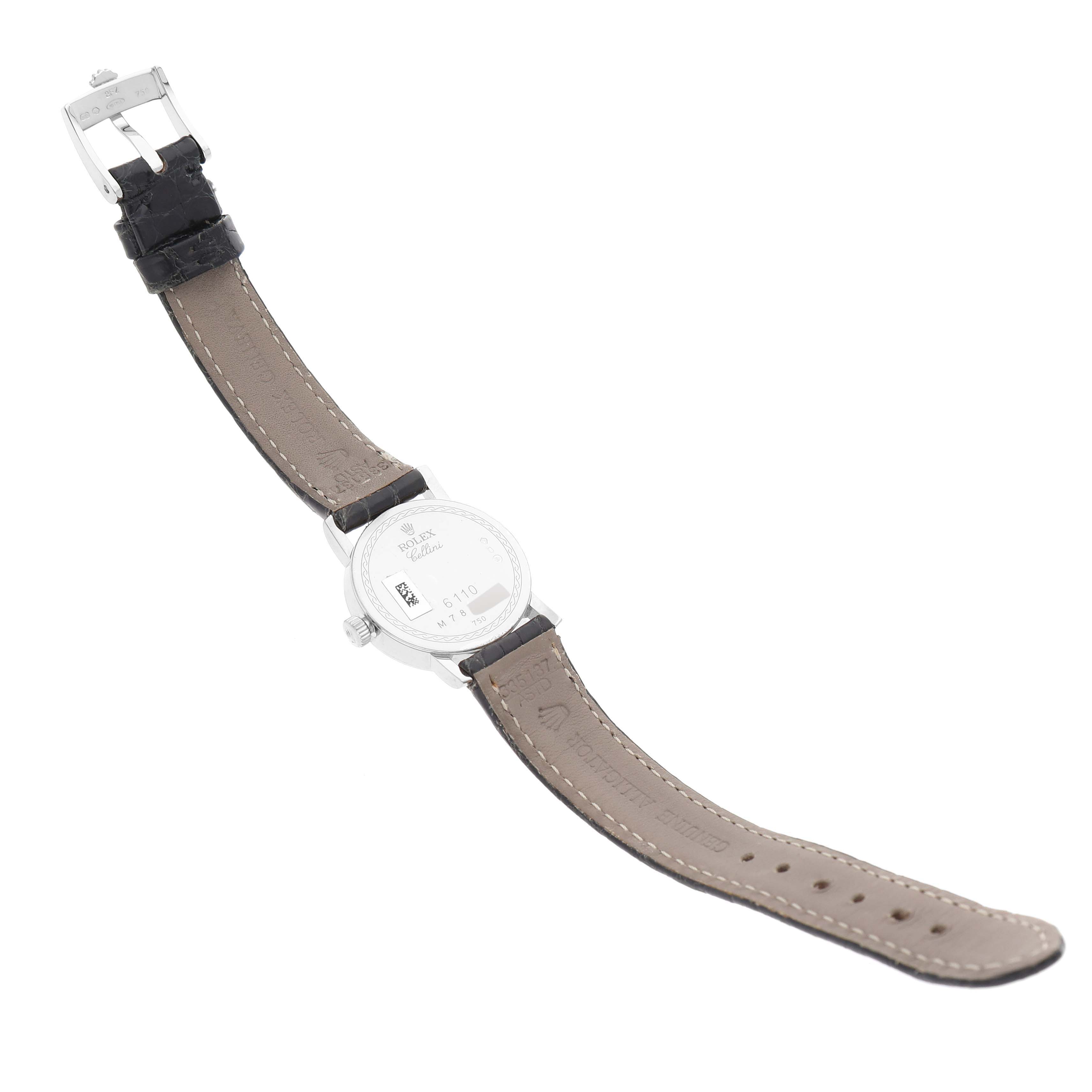 The image shows the back and strap of a Rolex Cellini 6110/9 Women's White Gold Mother of Pearl Dial 6110/9 Women's White Gold Mother of Pearl Dial watch laid flat, displaying the buckle and case back details.