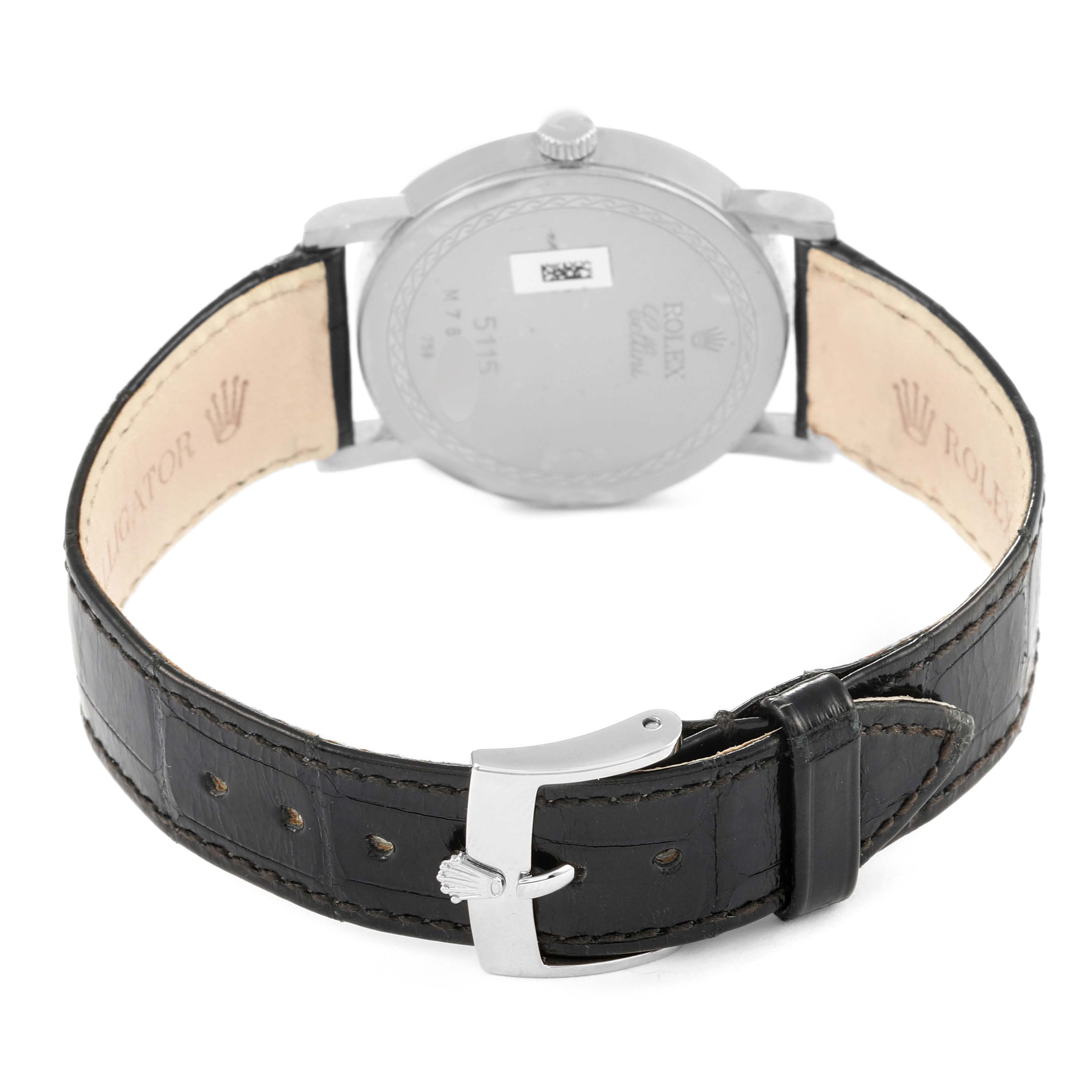 The image shows the back view of a Rolex Cellini 5115/9 Men's White Gold Mother of Pearl Dial 5115/9 Men's White Gold Mother of Pearl Dial watch, highlighting the case back and leather strap with a buckle.
