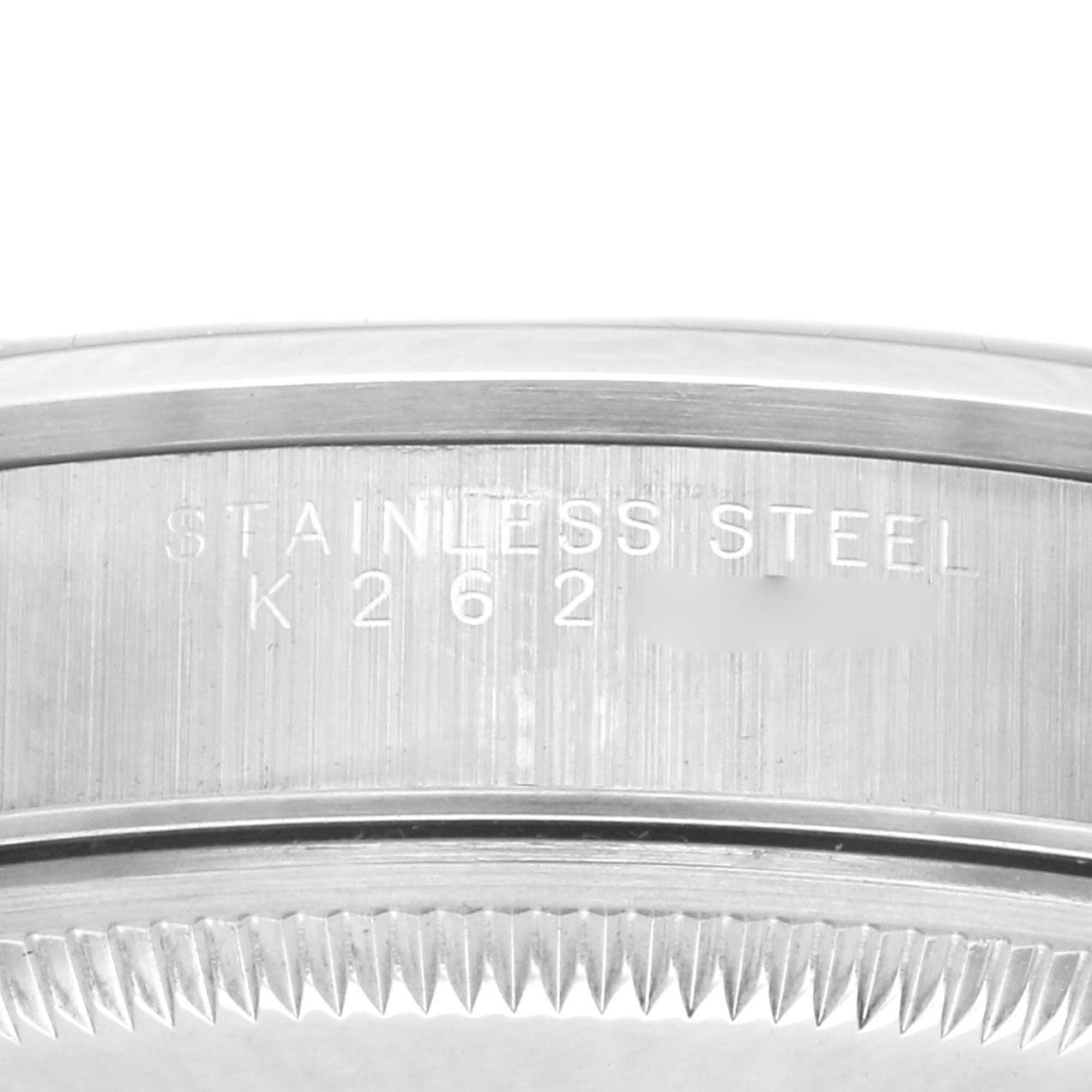 The image shows a close-up of the case side of a Rolex Date 15200 Men's Stainless Steel Black Dial 15200 Men's Stainless Steel Black Dial model, highlighting its stainless steel material and engraved details.