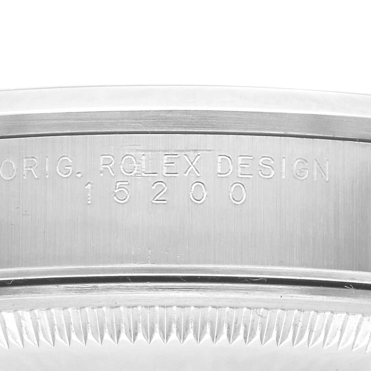 The image displays the side engraving on the casing of a Rolex Date 15200 Men's Stainless Steel Black Dial 15200 Men's Stainless Steel Black Dial model, showing "ORIG. ROLEX DESIGN 15200".
